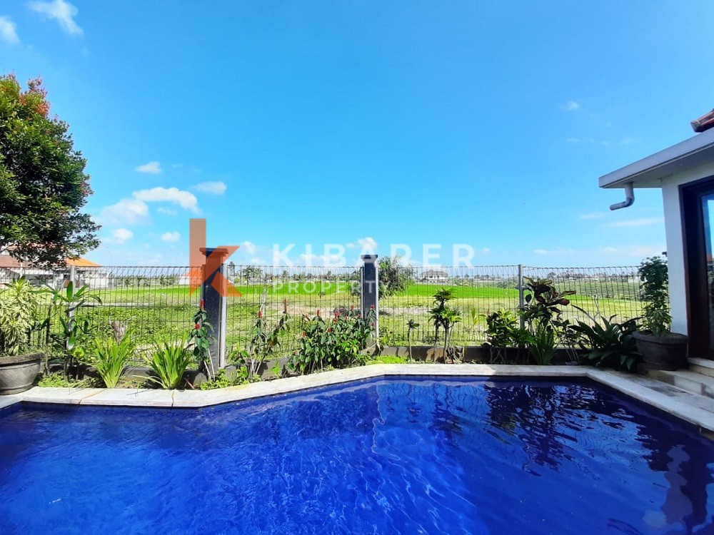 Cozy Two Bedroom Villa semi furnished with rice field view in Cemagi