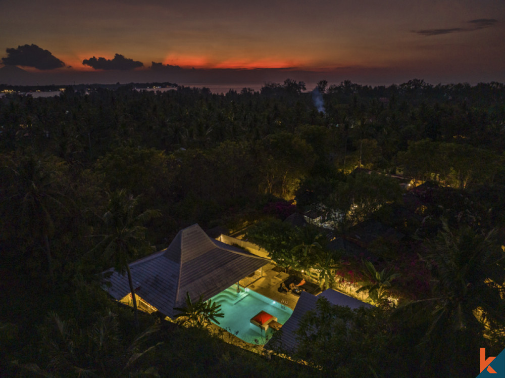 Maison de vacances tropicale près de la plage à Gili Meno