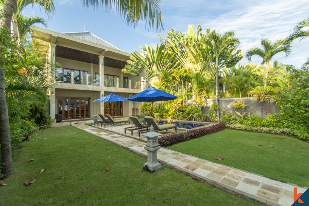 Propriété en bord de mer à l'intérieur d'un centre de villégiature