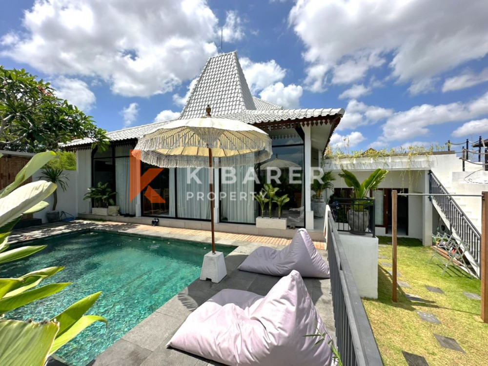 Superbe villa fermée de quatre chambres avec vue sur les rizières à Canggu