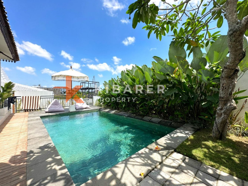 Superbe villa fermée de quatre chambres avec vue sur les rizières à Canggu