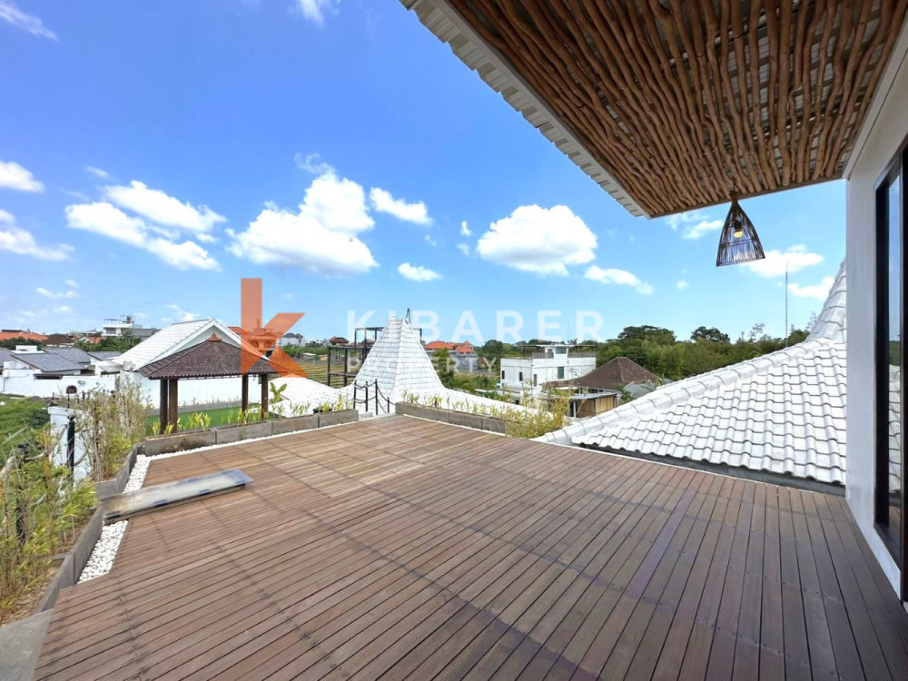 Superbe villa fermée de quatre chambres avec vue sur les rizières à Canggu