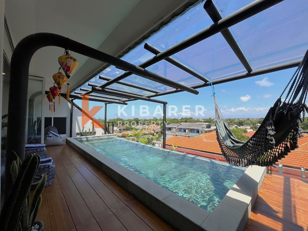 Penthouse élégant de deux chambres avec piscine privée situé à Batu Belig