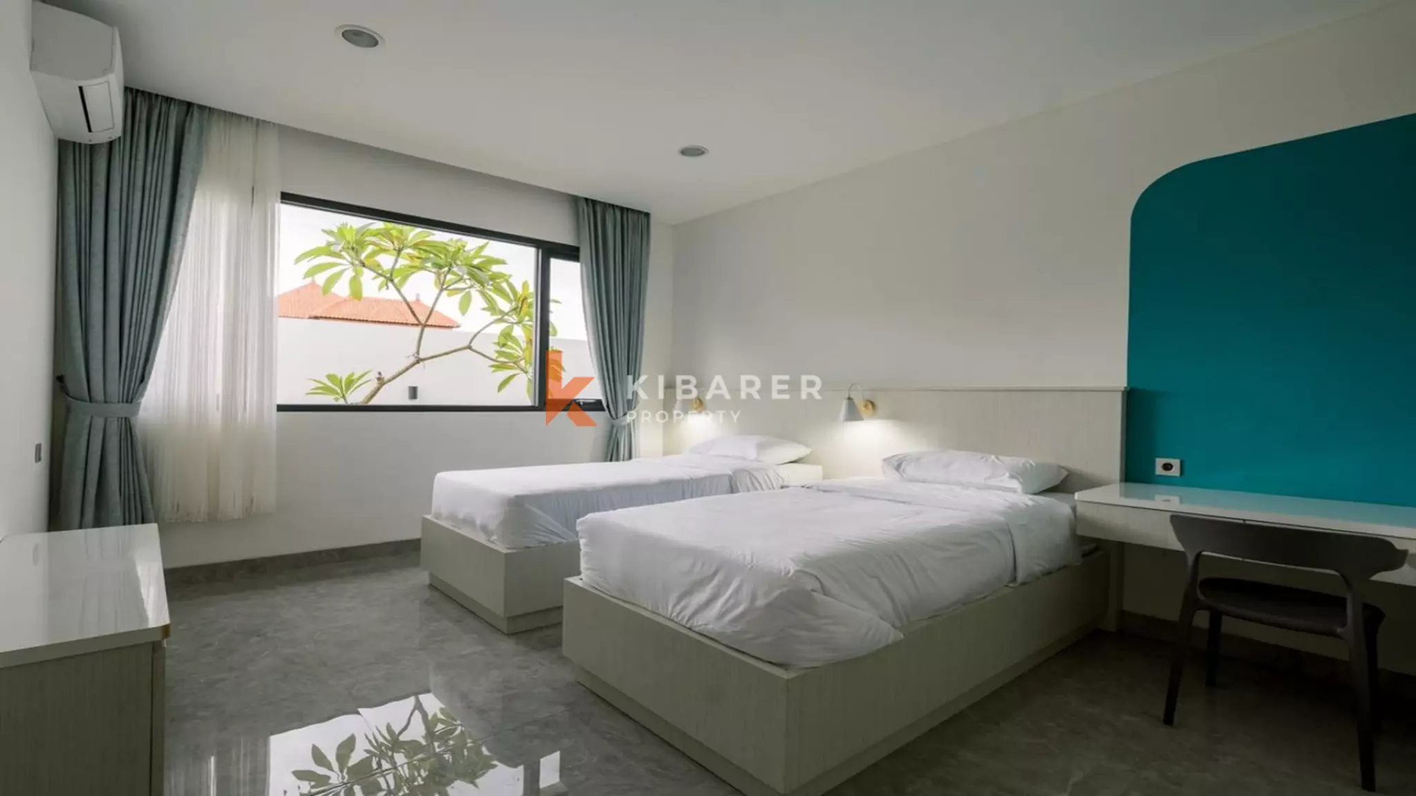 Modern Two-Bedroom Furnished Villa with Shared Pool in Denpasar