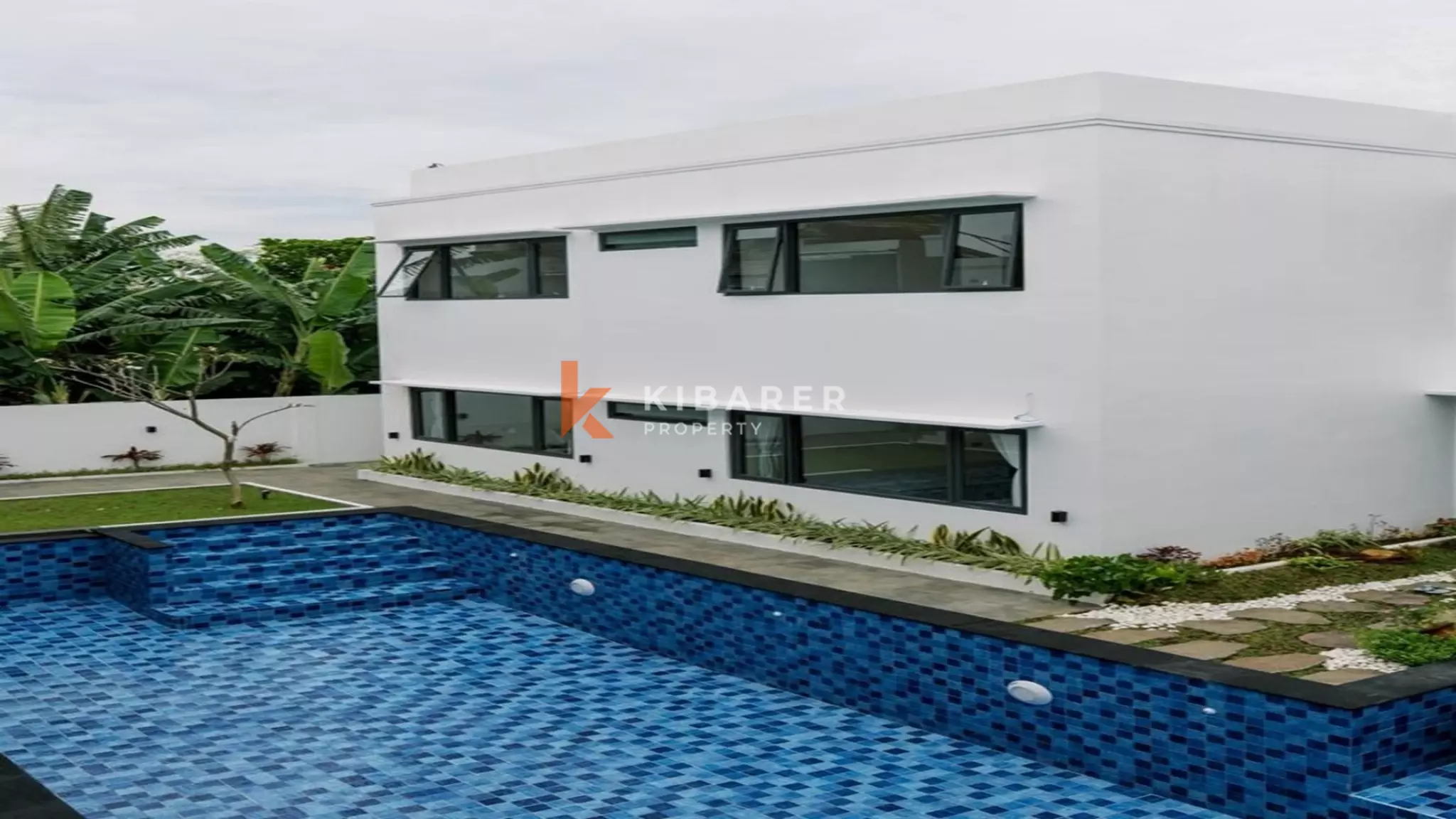 Modern Two-Bedroom Furnished Villa with Shared Pool in Denpasar