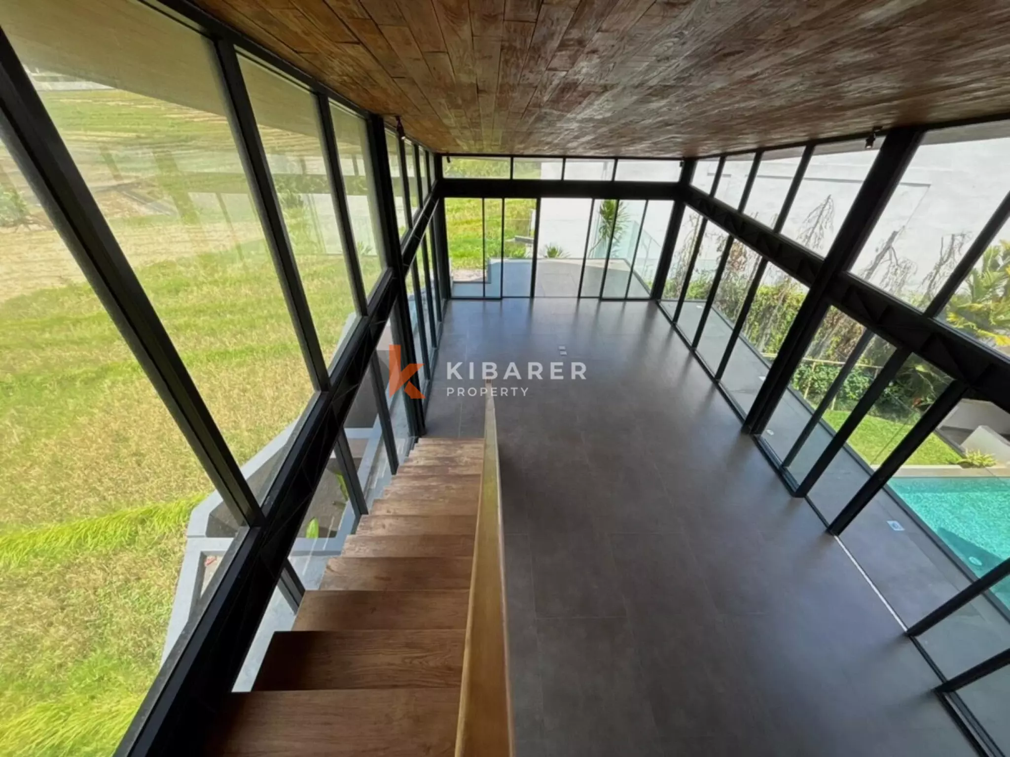 Modern Elegant Three Bedroom Villa with Mezzanine Retreat Overlooking Rice Fields in Cemagi
