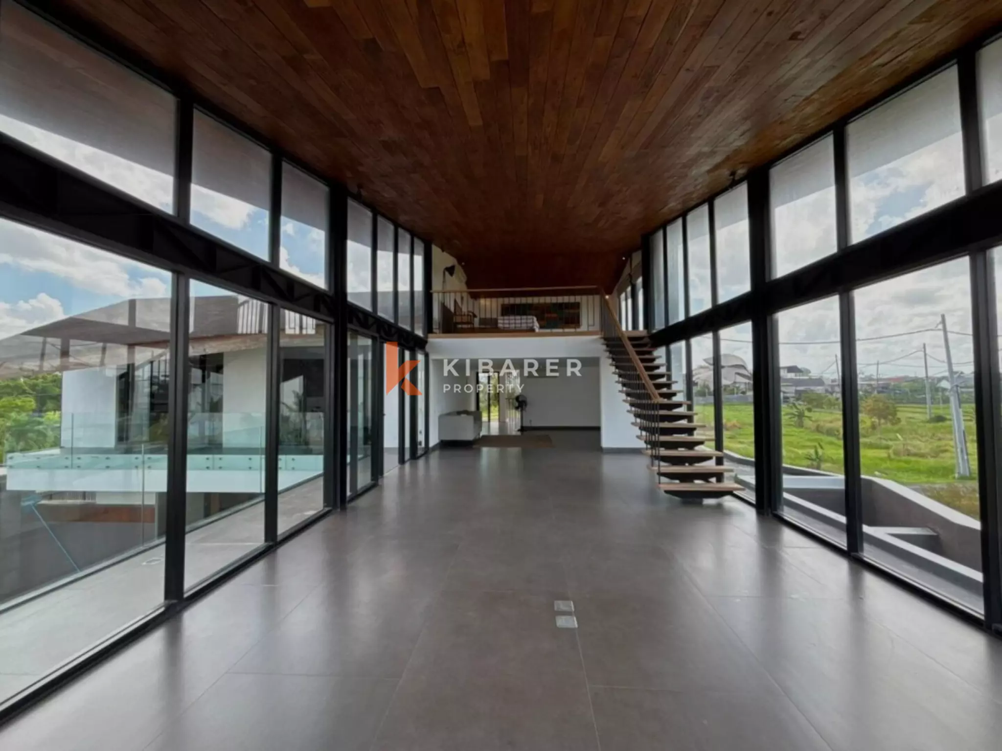 Modern Elegant Three Bedroom Villa with Mezzanine Retreat Overlooking Rice Fields in Cemagi