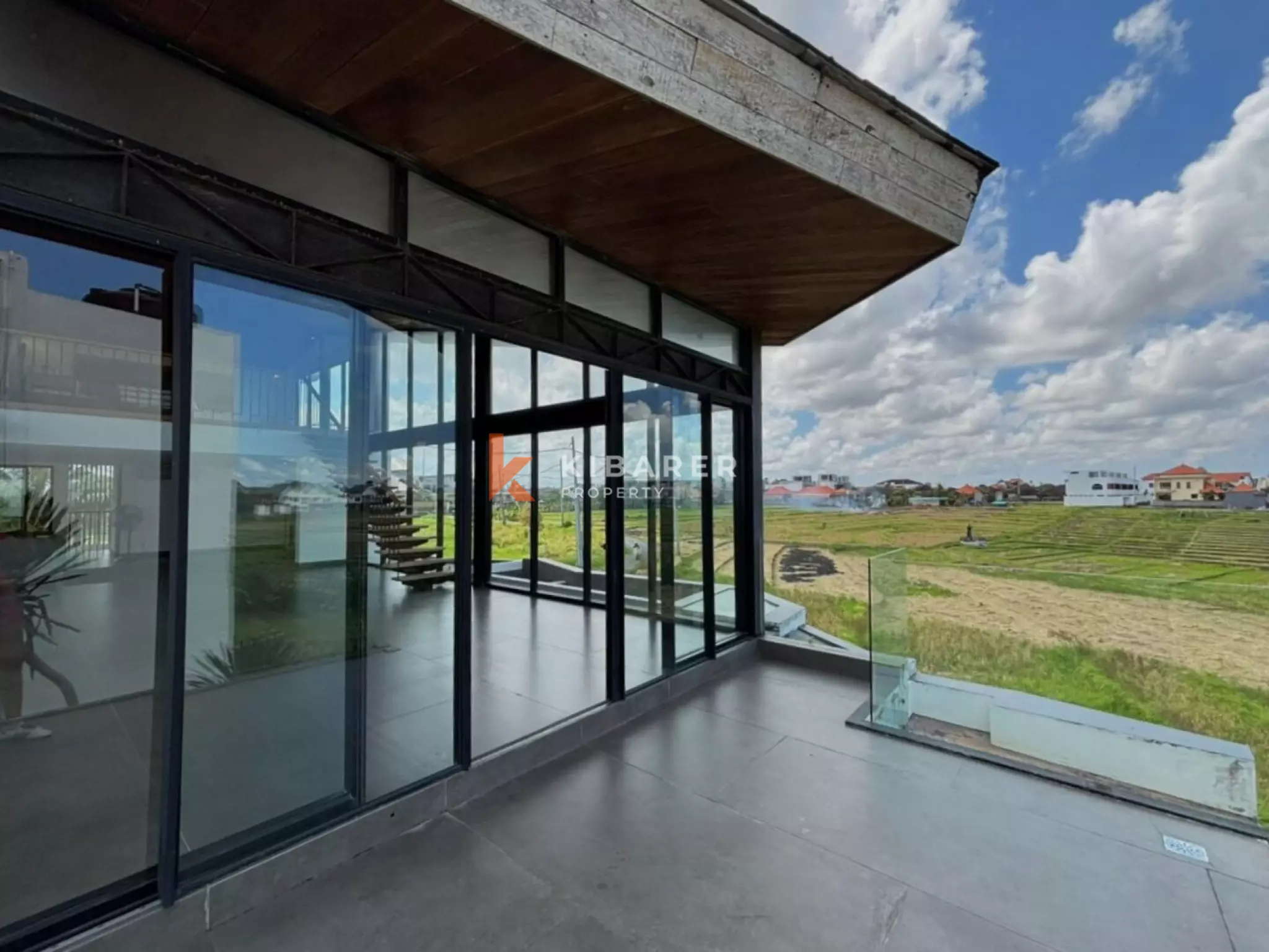 Modern Elegant Three Bedroom Villa with Mezzanine Retreat Overlooking Rice Fields in Cemagi