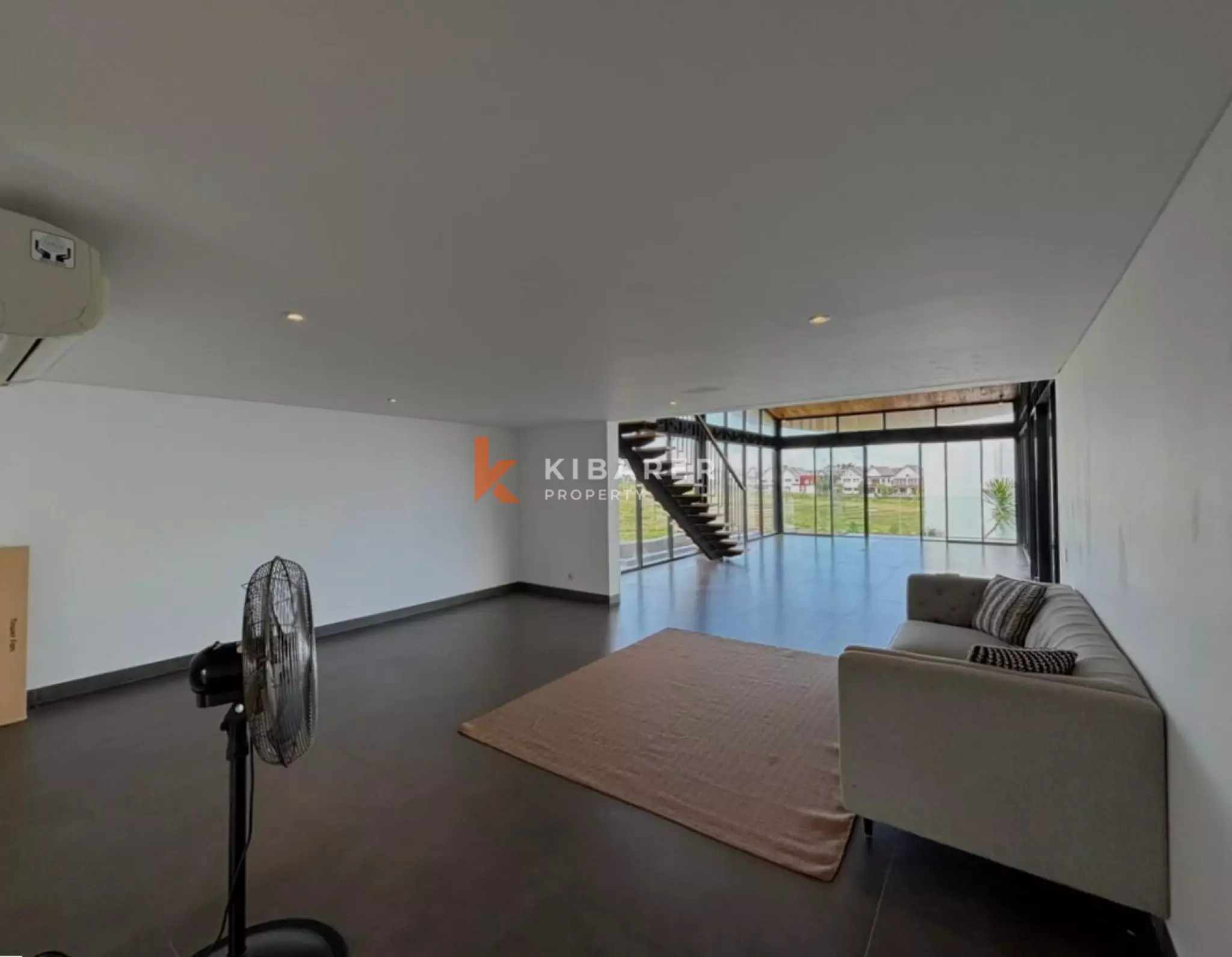 Modern Elegant Three Bedroom Villa with Mezzanine Retreat Overlooking Rice Fields in Cemagi