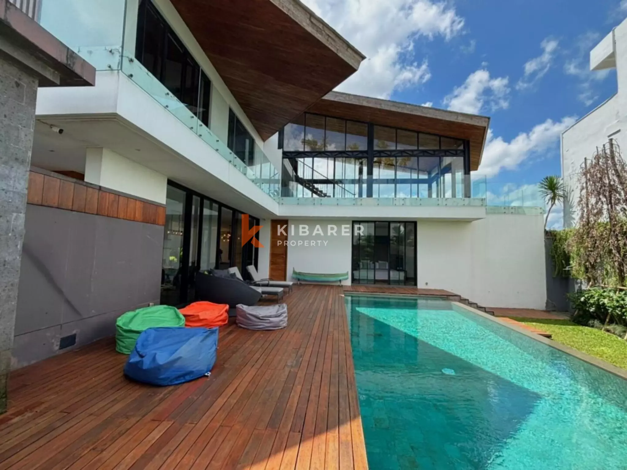 Modern Elegant Three Bedroom Villa with Mezzanine Retreat Overlooking Rice Fields in Cemagi