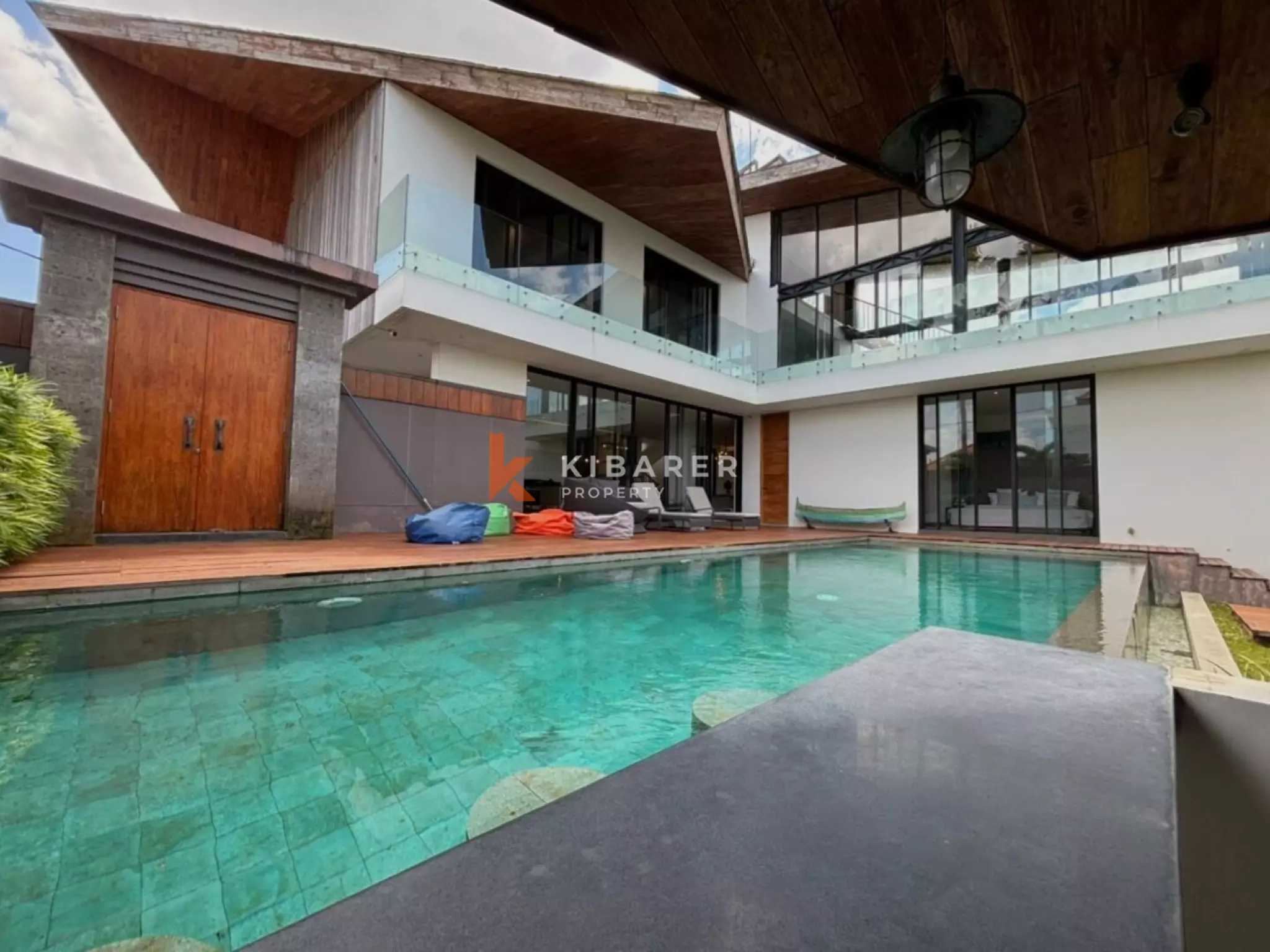 Modern Elegant Three Bedroom Villa with Mezzanine Retreat Overlooking Rice Fields in Cemagi