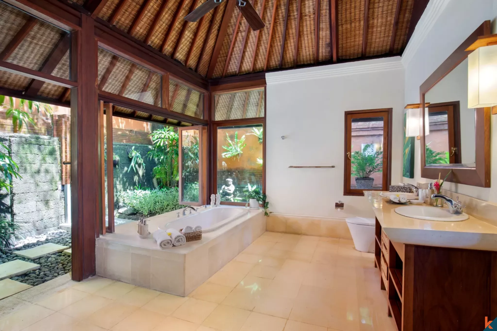 Gorgeous Four Bedroom Freehold Real Estate with Traditional Influences in Pererenan