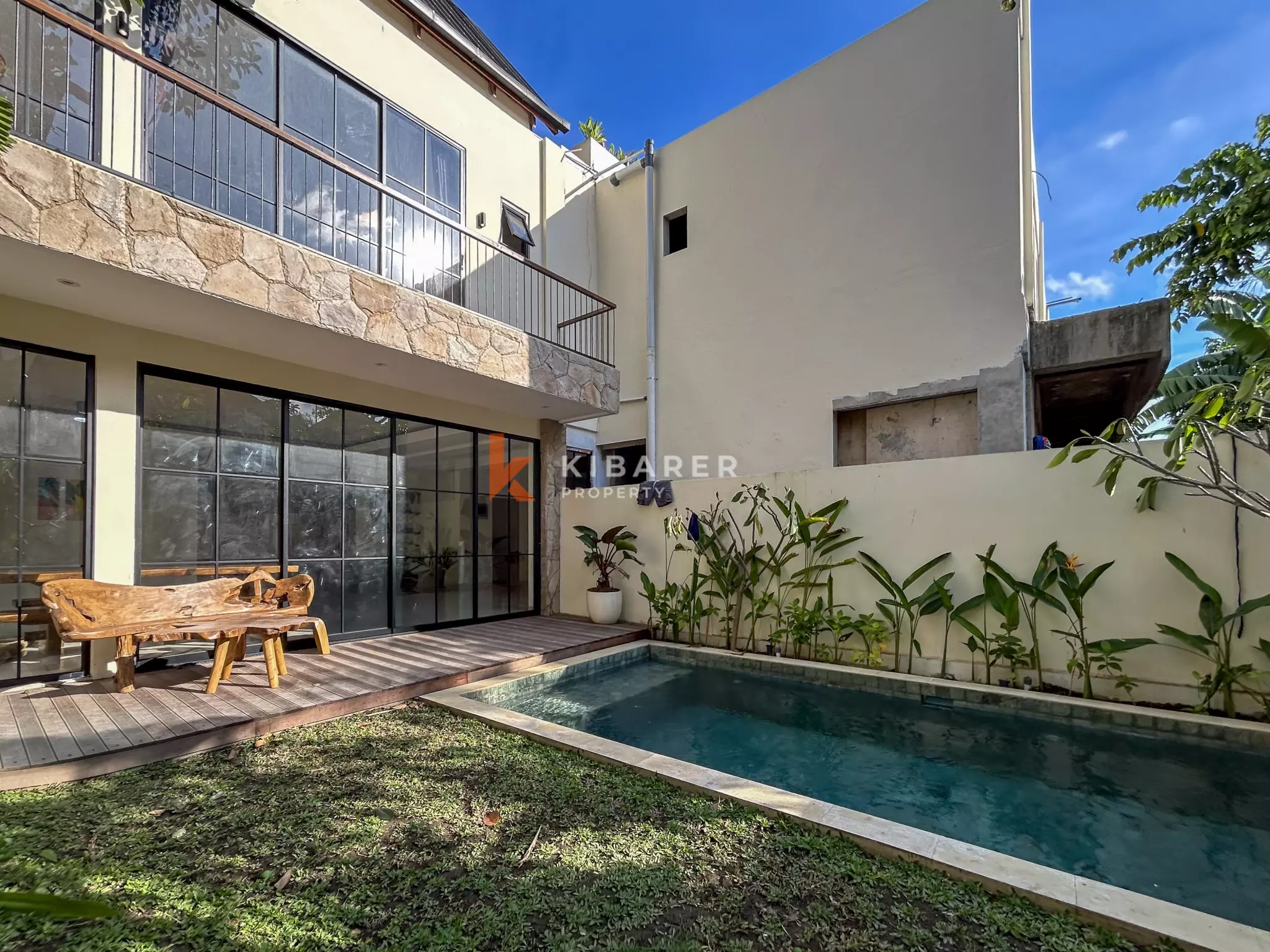 Modern Tropical Two-Bedroom Villa with Enclosed Living in Umalas