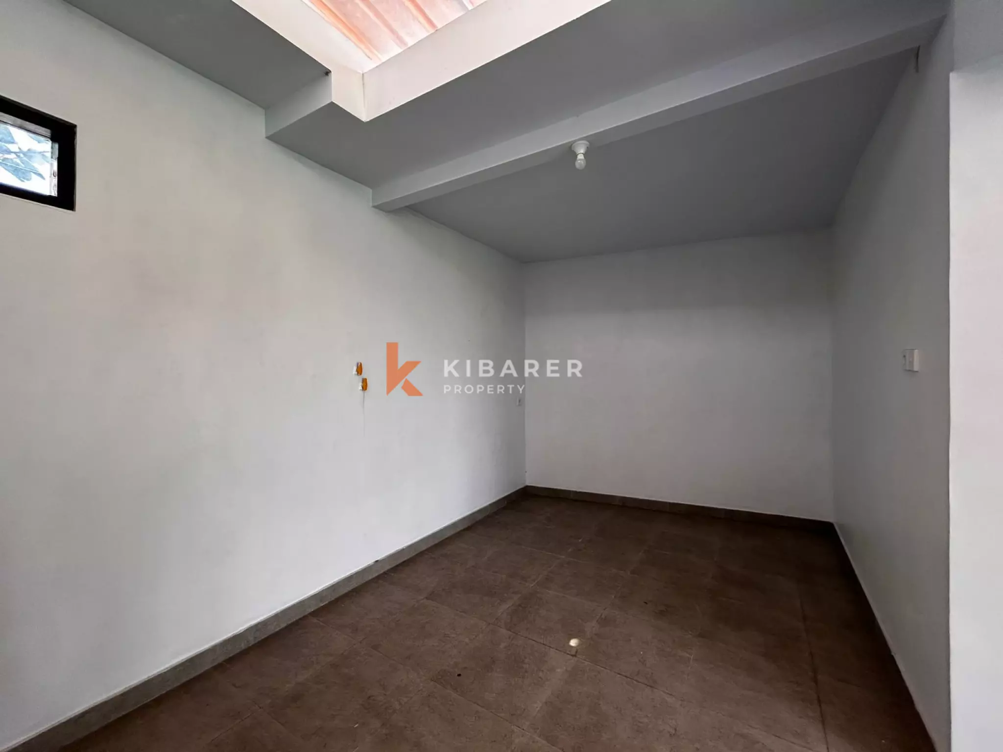 Spacious Four-Bedroom Unfurnished Villa with Open Kitchen and Private Pool in Padonan