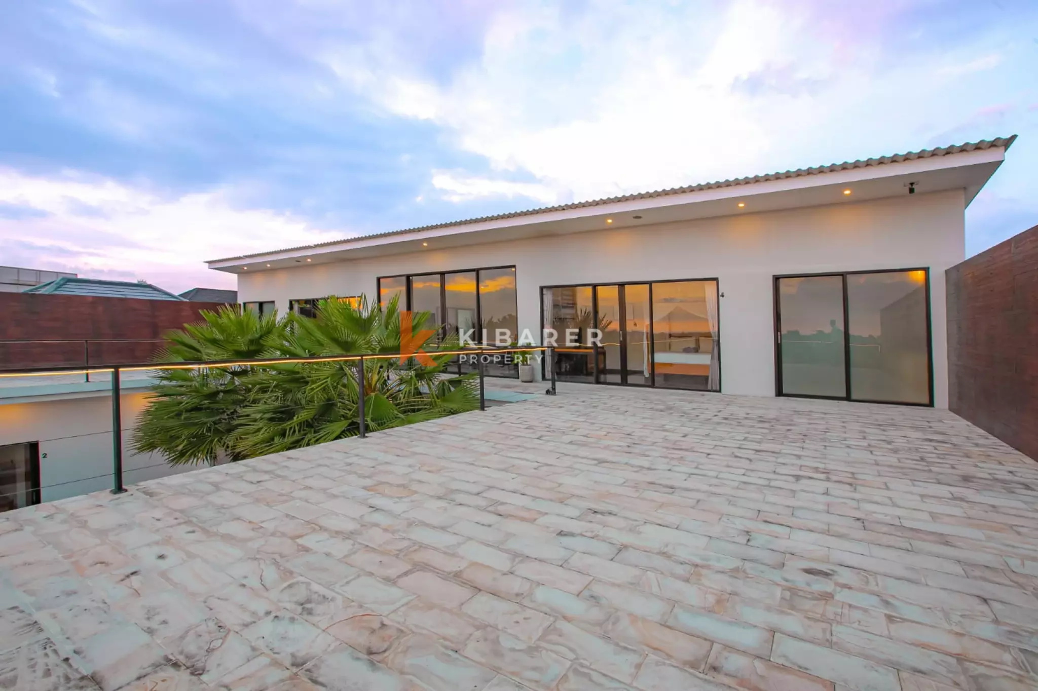 Stylish Four-Bedroom Villa with Rooftop Rice Field Views Close to Berawa