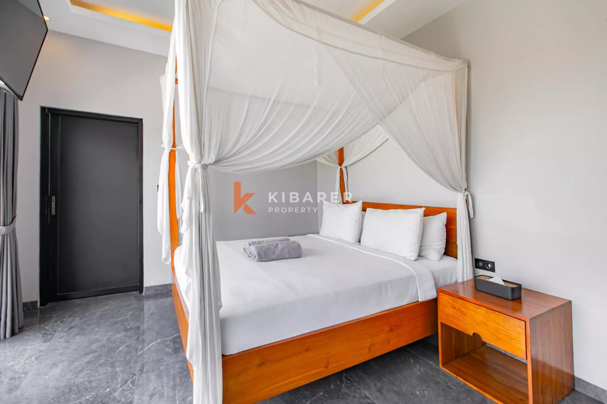 Stylish Four-Bedroom Villa with Rooftop Rice Field Views Close to Berawa