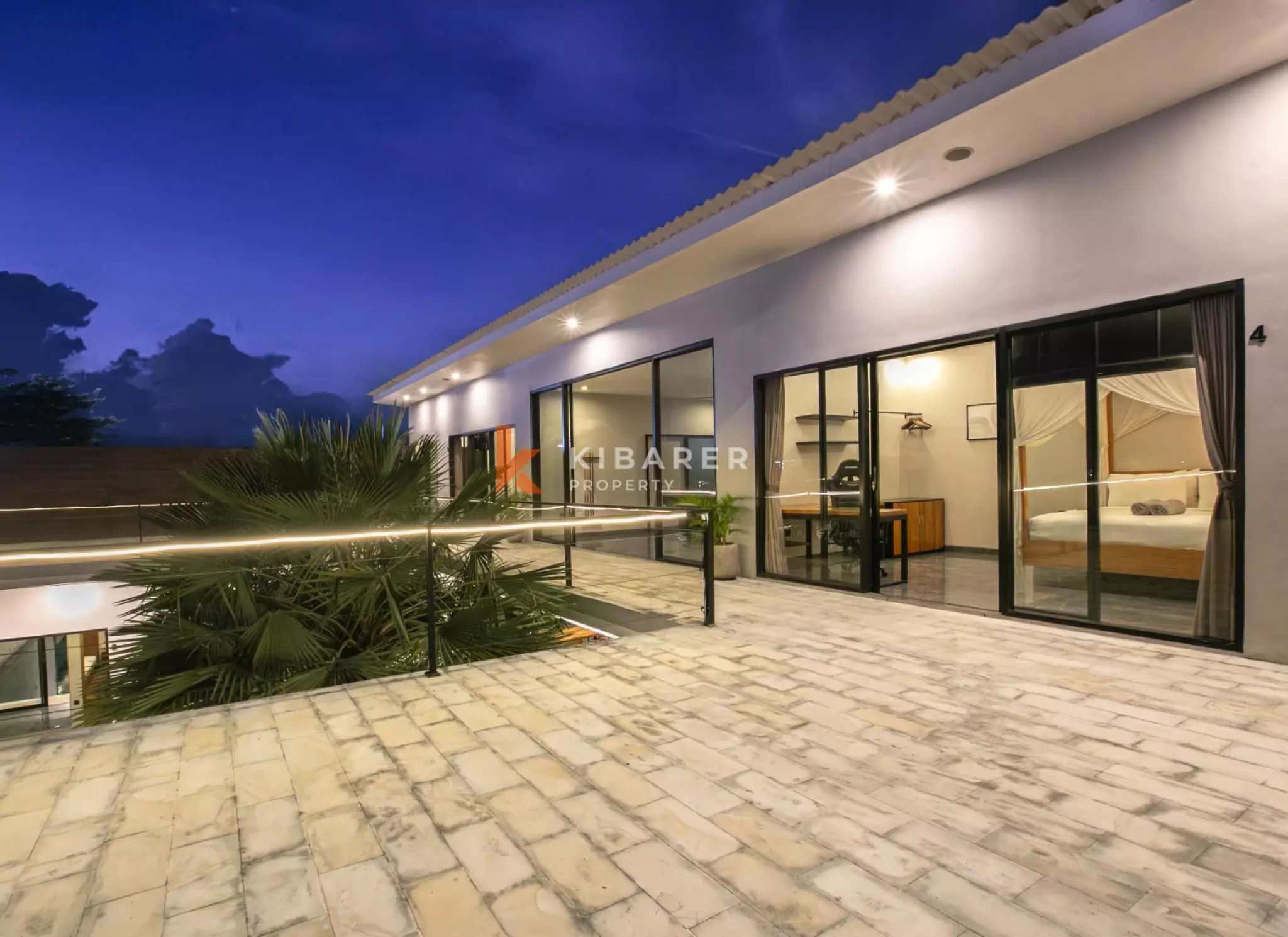 Stylish Four-Bedroom Villa with Rooftop Rice Field Views Close to Berawa