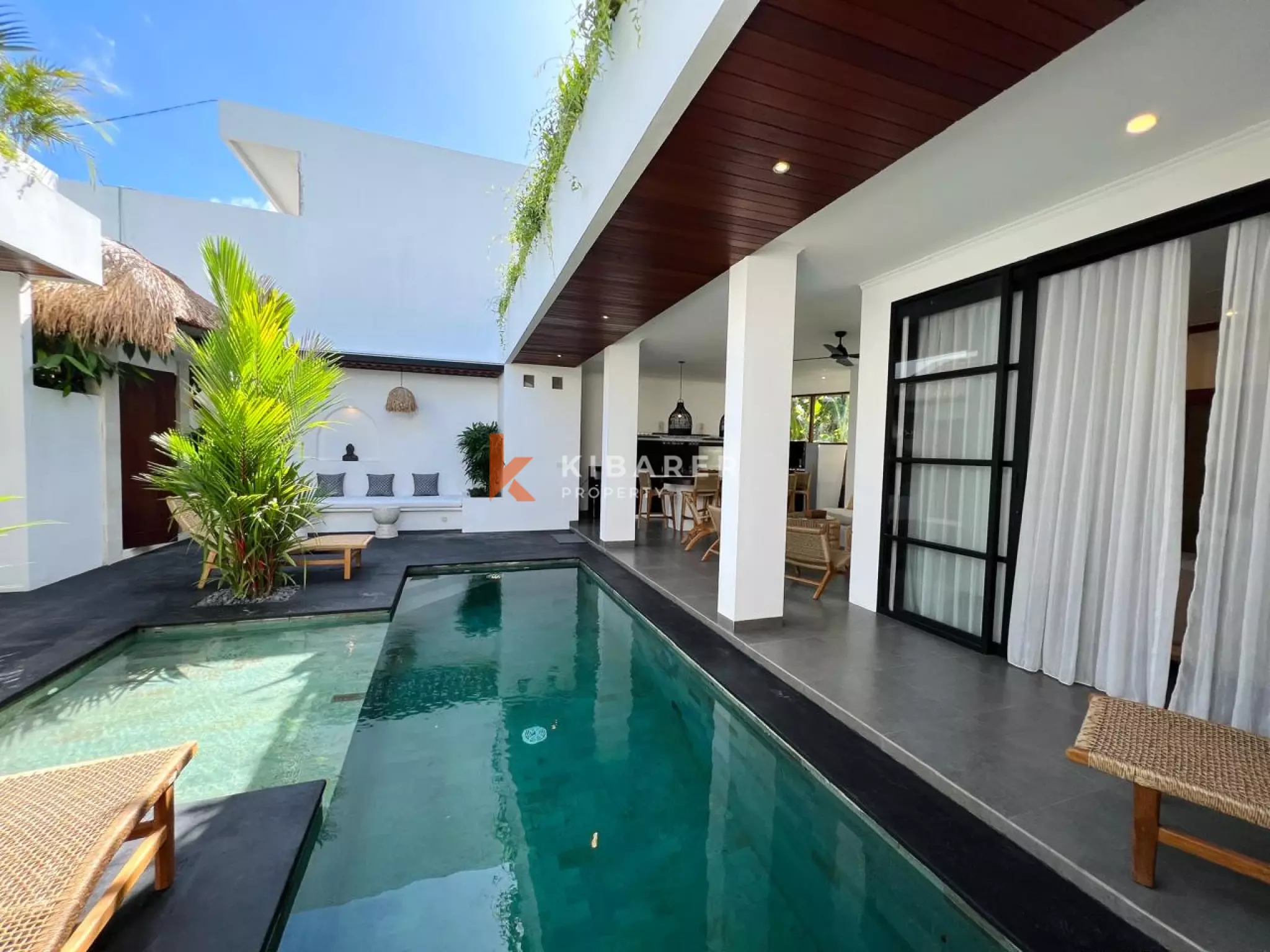 Modern Tropical Three-Bedroom Villa with Open Living & Rooftop Retreat in Tumbak Bayuh