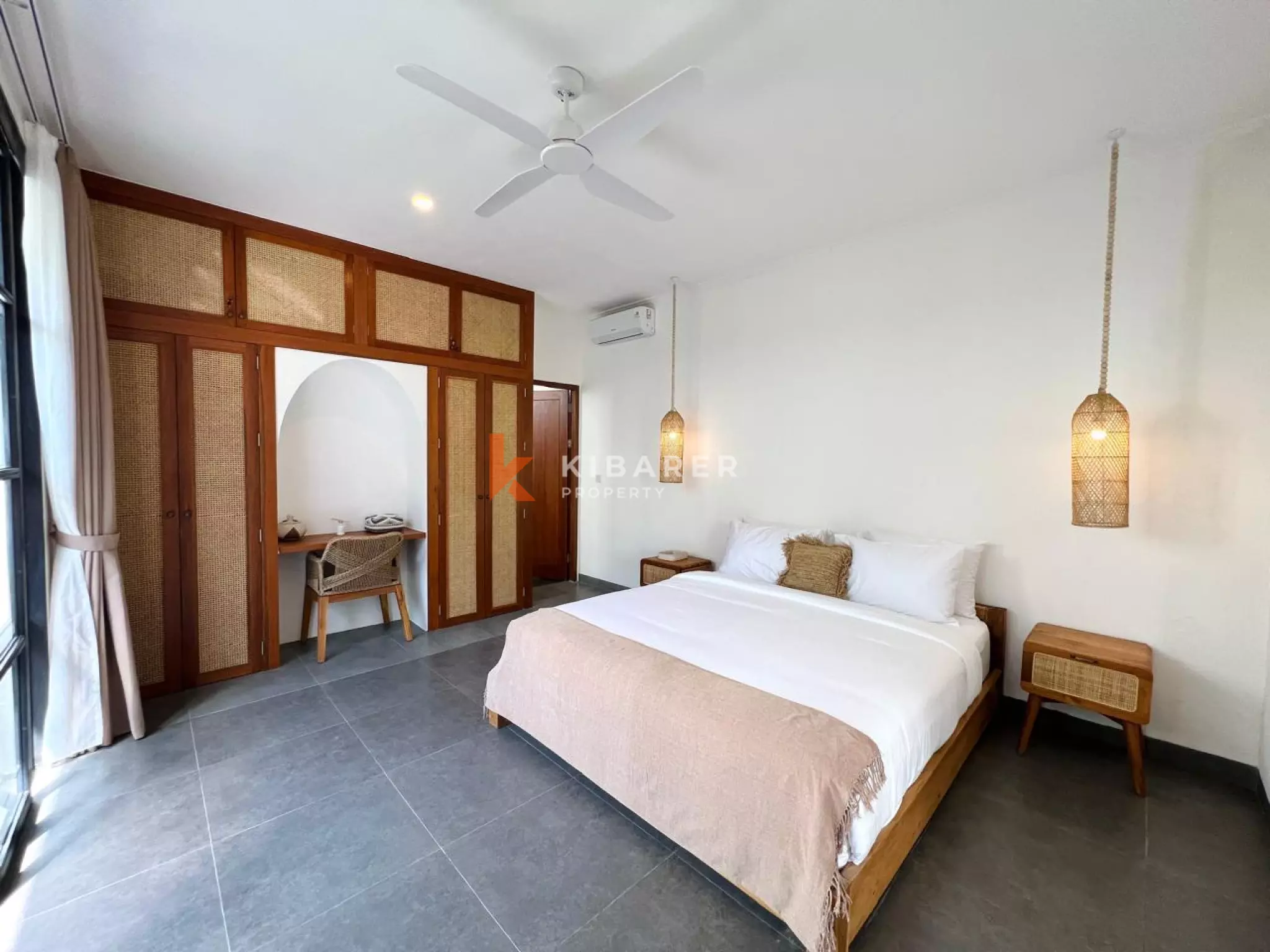 Modern Tropical Three-Bedroom Villa with Open Living & Rooftop Retreat in Tumbak Bayuh
