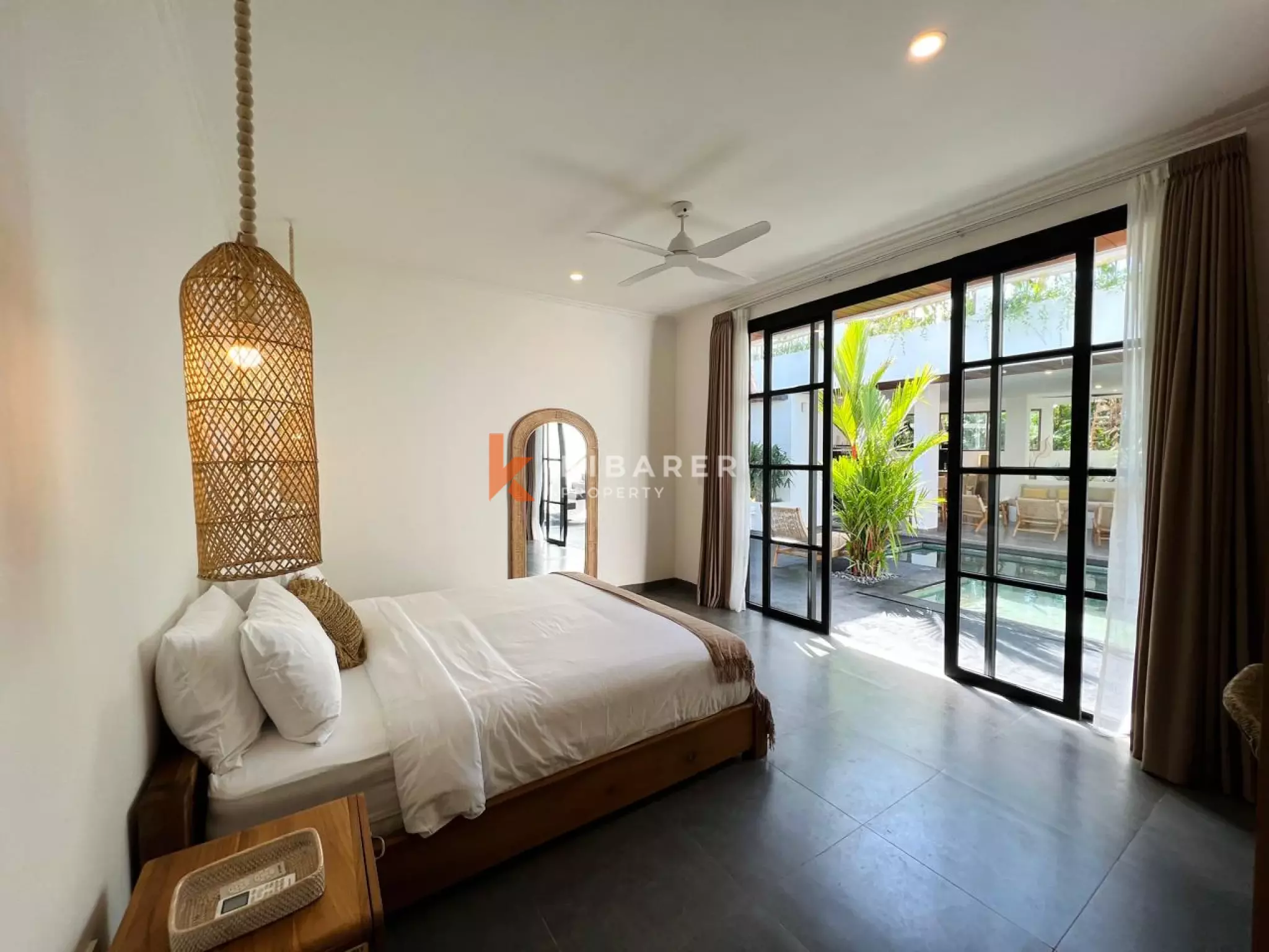 Modern Tropical Three-Bedroom Villa with Open Living & Rooftop Retreat in Tumbak Bayuh