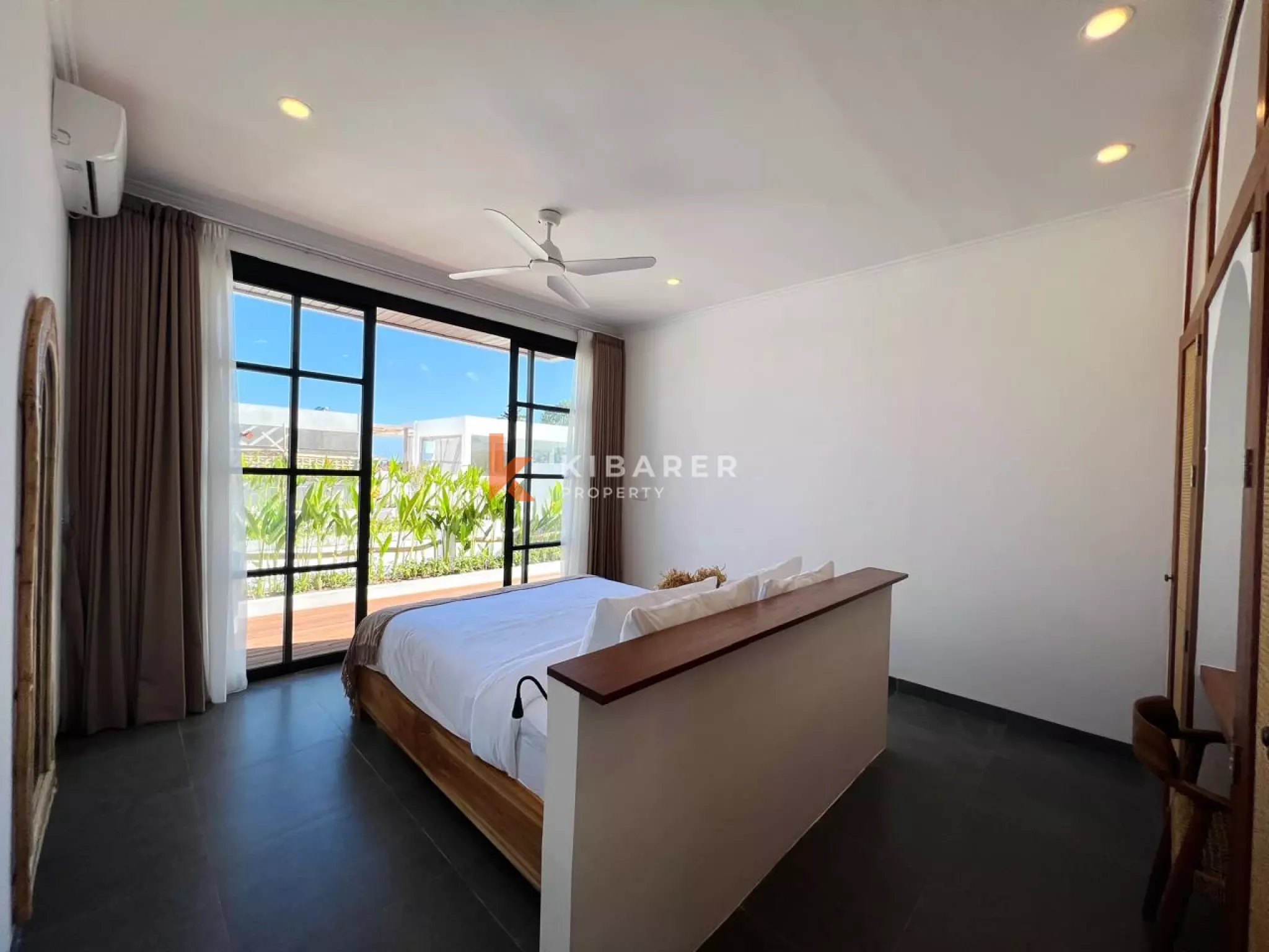 Modern Tropical Three-Bedroom Villa with Open Living & Rooftop Retreat in Tumbak Bayuh