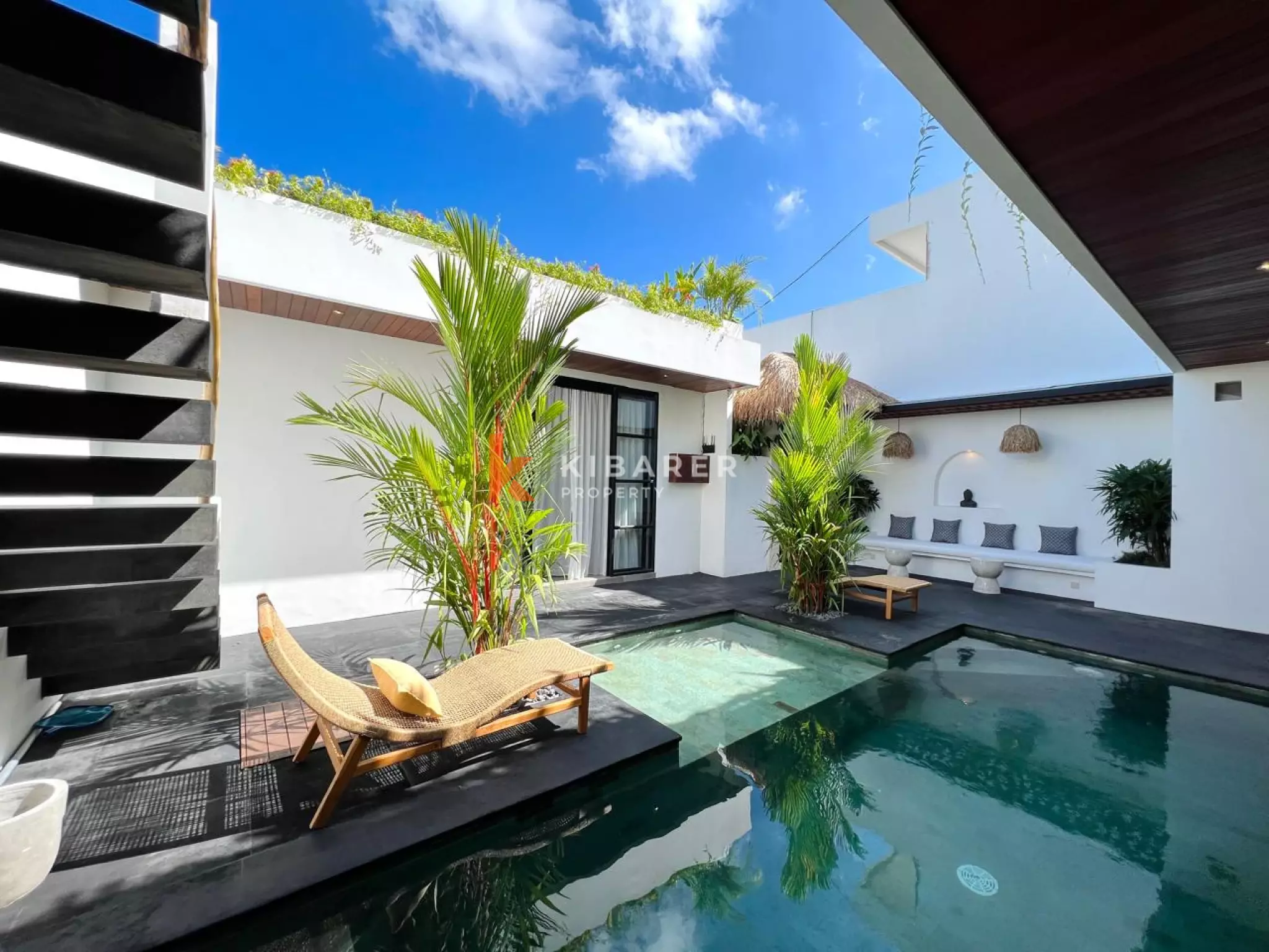 Modern Tropical Three-Bedroom Villa with Open Living & Rooftop Retreat in Tumbak Bayuh