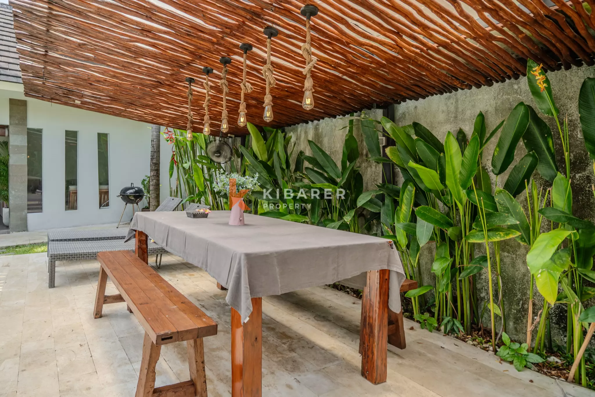 Cozy Three-Bedroom Tropical Open Living Villa with Garden and Pool in Seminyak