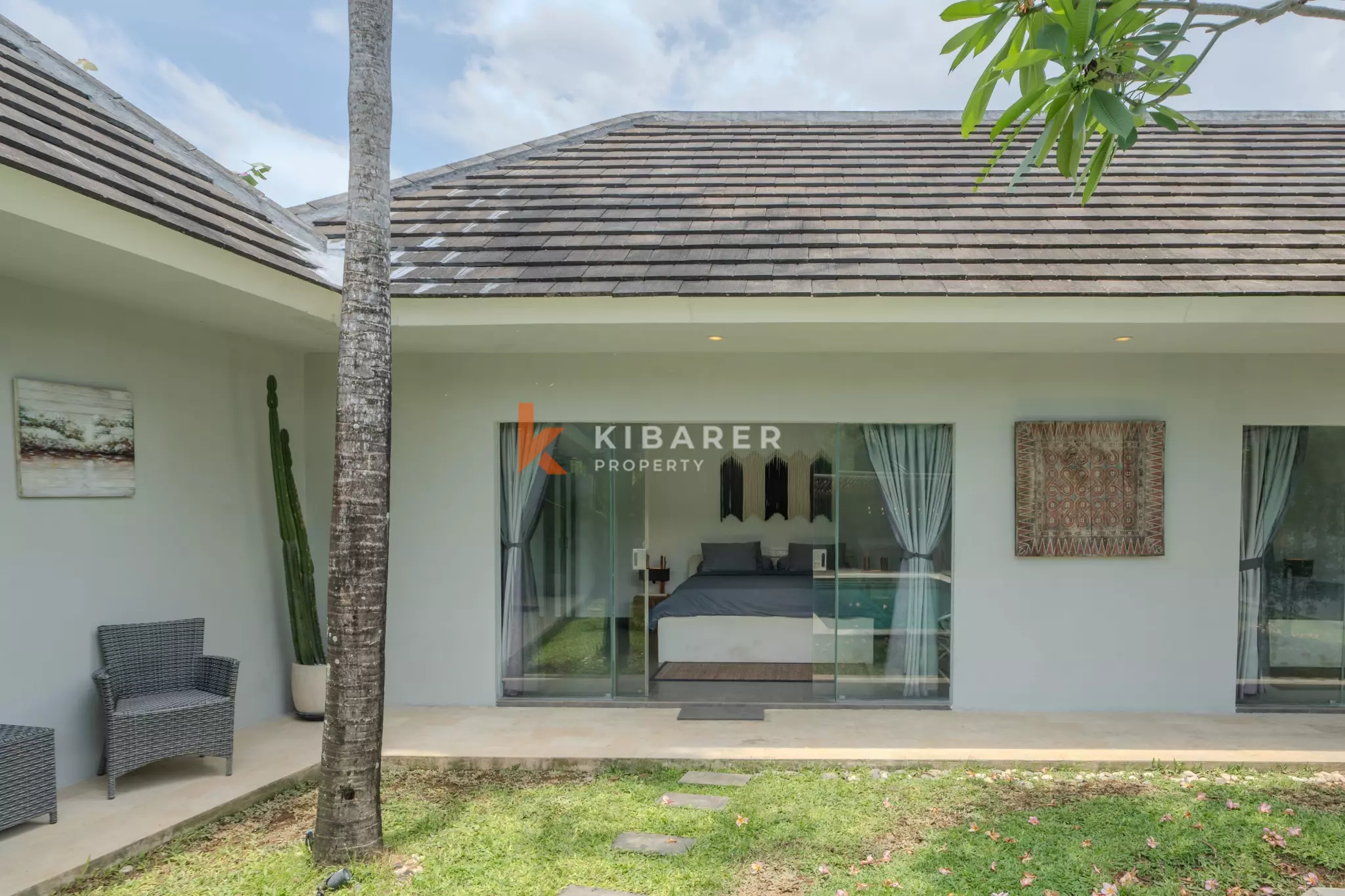 Cozy Three-Bedroom Tropical Open Living Villa with Garden and Pool in Seminyak