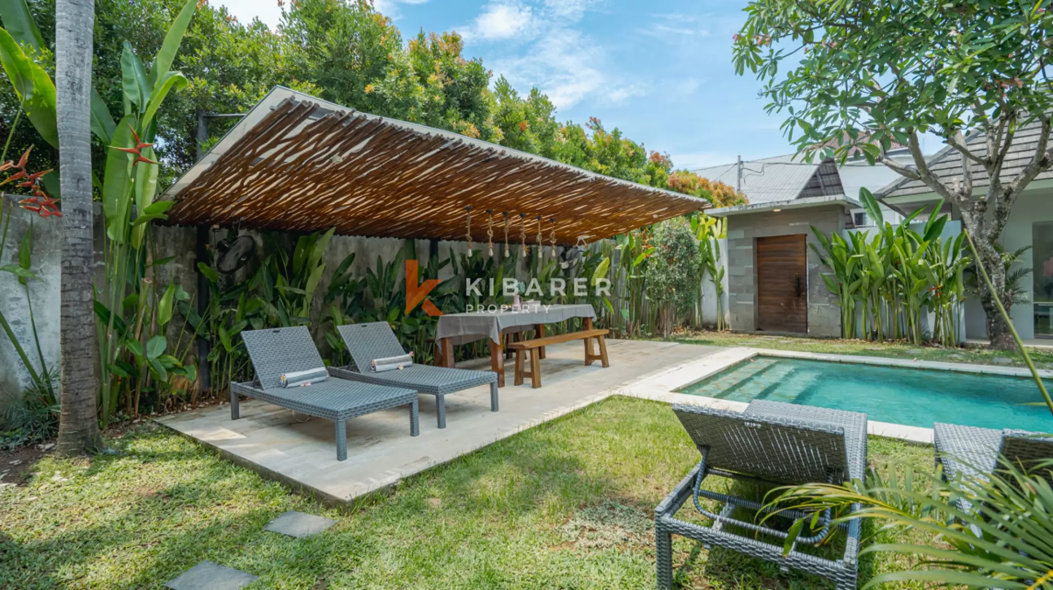 Cozy Three-Bedroom Tropical Open Living Villa with Garden and Pool in Seminyak