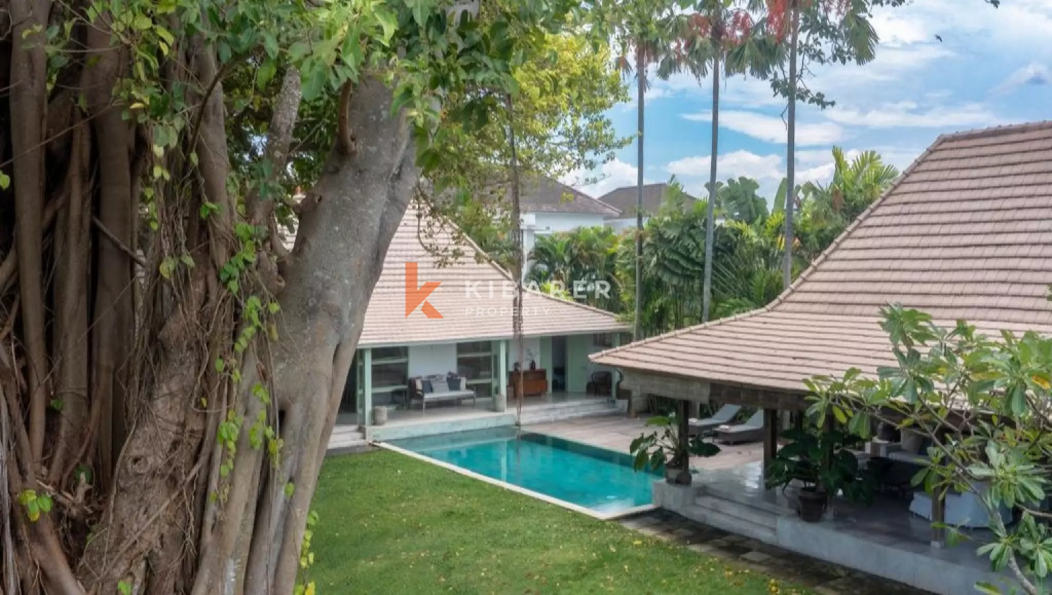 Timeless Tropical Four-Bedroom Villa with Open Living in Umalas