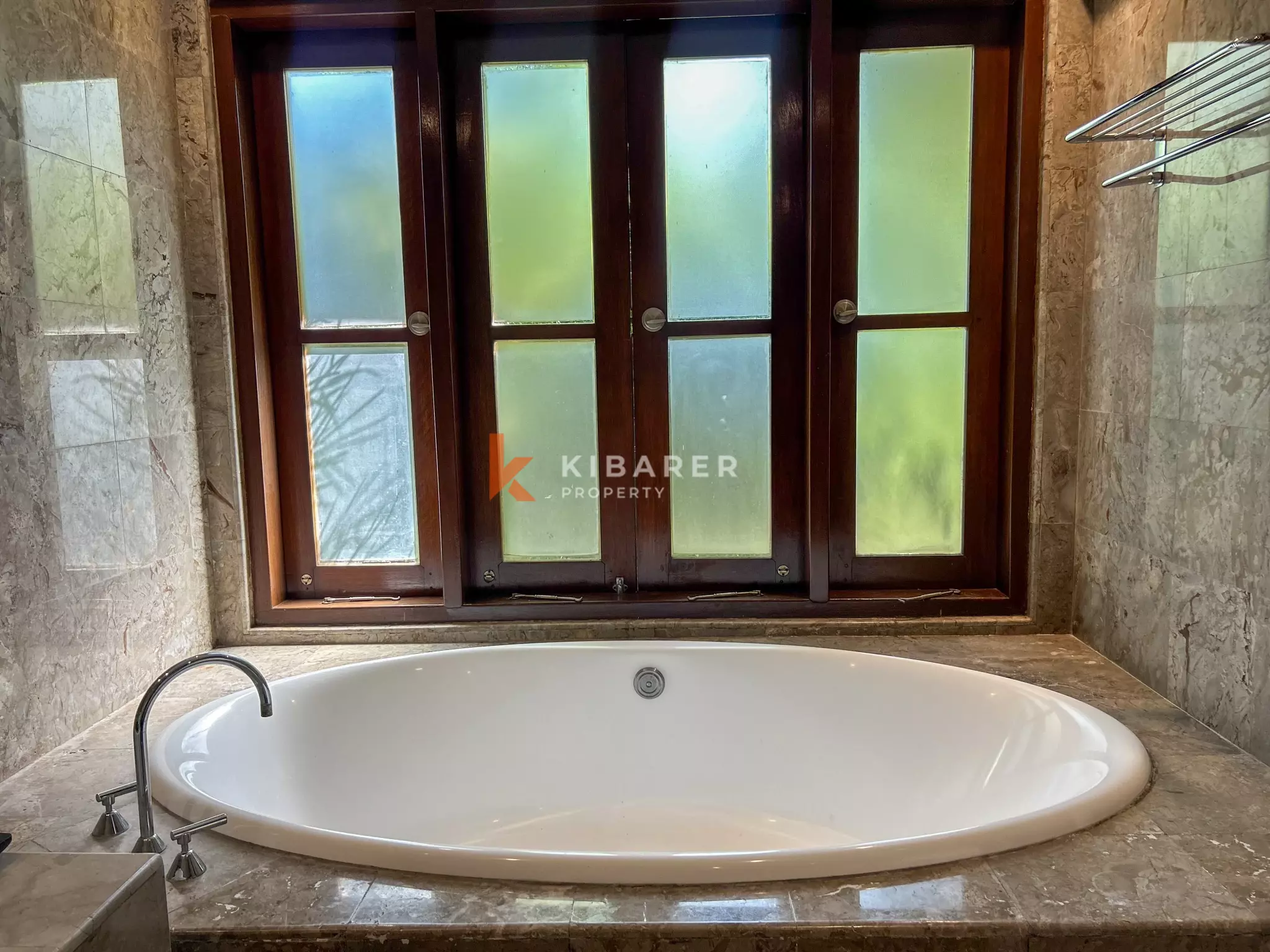 Elegant Four-Bedroom Tropical Oasis with Lush Garden and Private Pool in Umalas