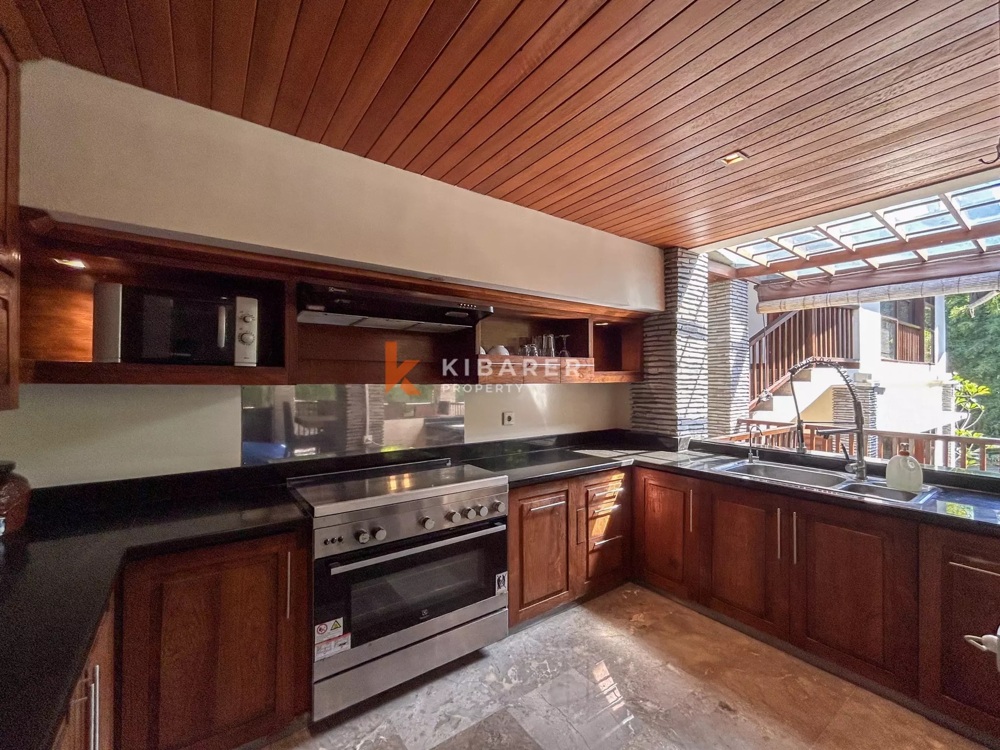 Elegant Four-Bedroom Tropical Oasis with Lush Garden and Private Pool in Umalas