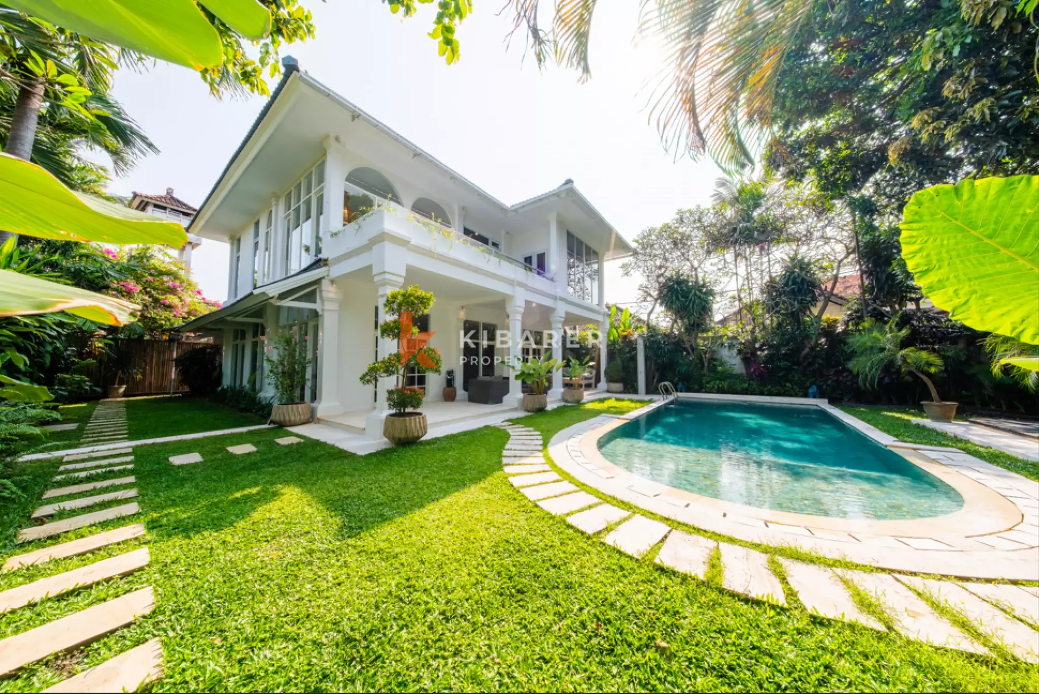 Elegant Four-Bedroom Tropical Villa with Private Pool and Lush Garden in Batu Belig