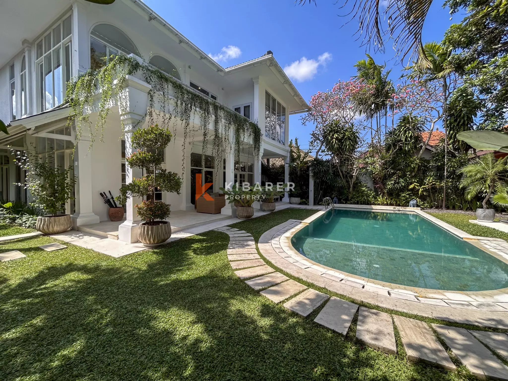 Elegant Four-Bedroom Tropical Villa with Private Pool and Lush Garden in Batu Belig