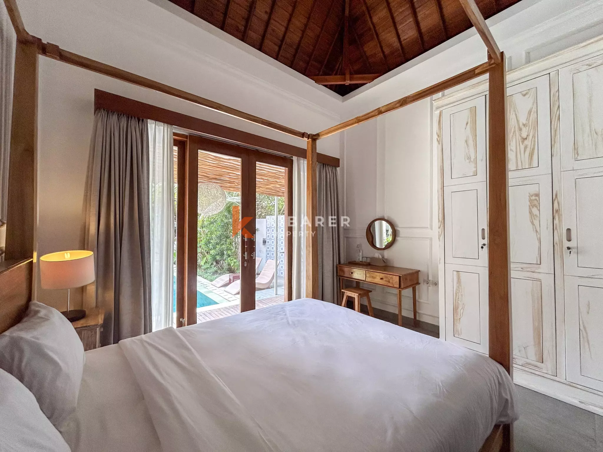 Elegant Four-Bedroom Tropical Pool Villa with Enclosed Living Spaces in Umalas