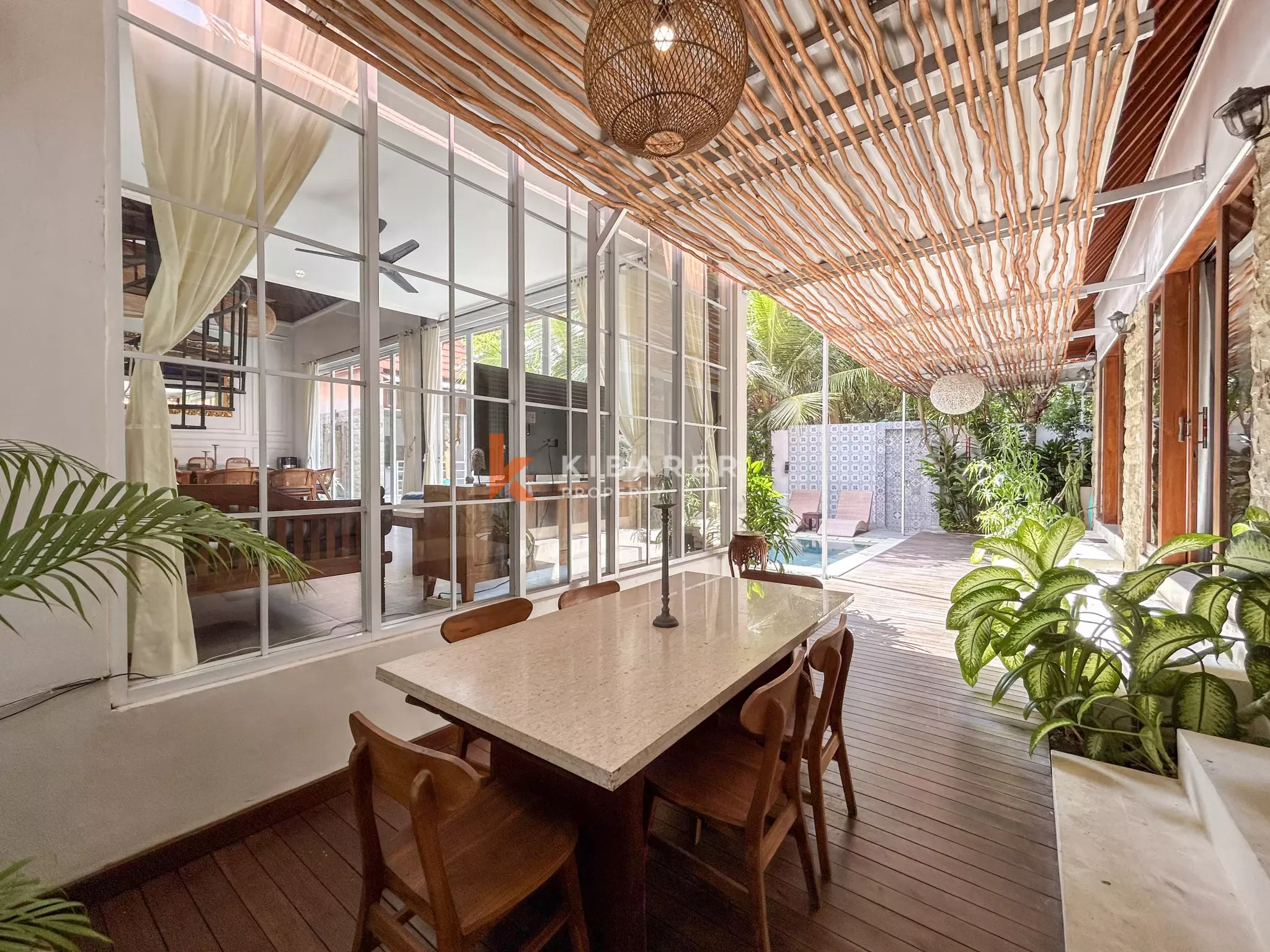 Elegant Four-Bedroom Tropical Pool Villa with Enclosed Living Spaces in Umalas