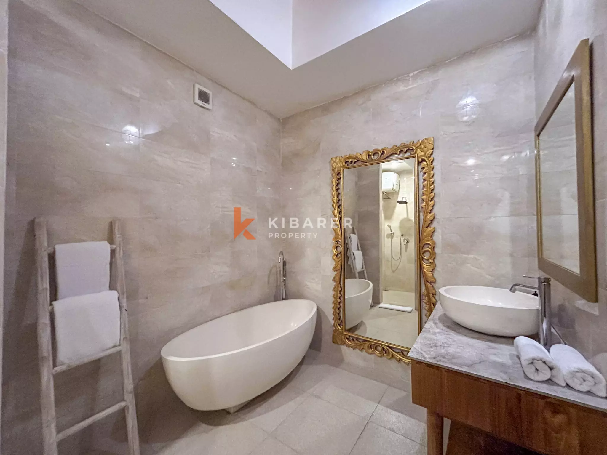 Elegant Four-Bedroom Tropical Pool Villa with Enclosed Living Spaces in Umalas