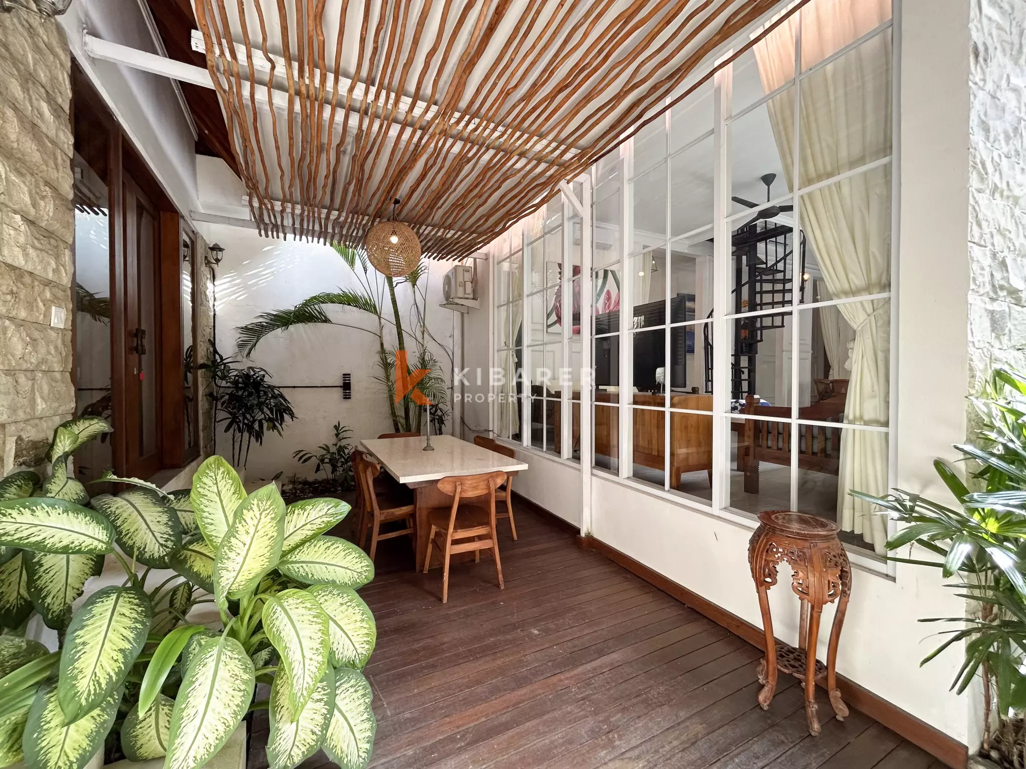 Elegant Four-Bedroom Tropical Pool Villa with Enclosed Living Spaces in Umalas
