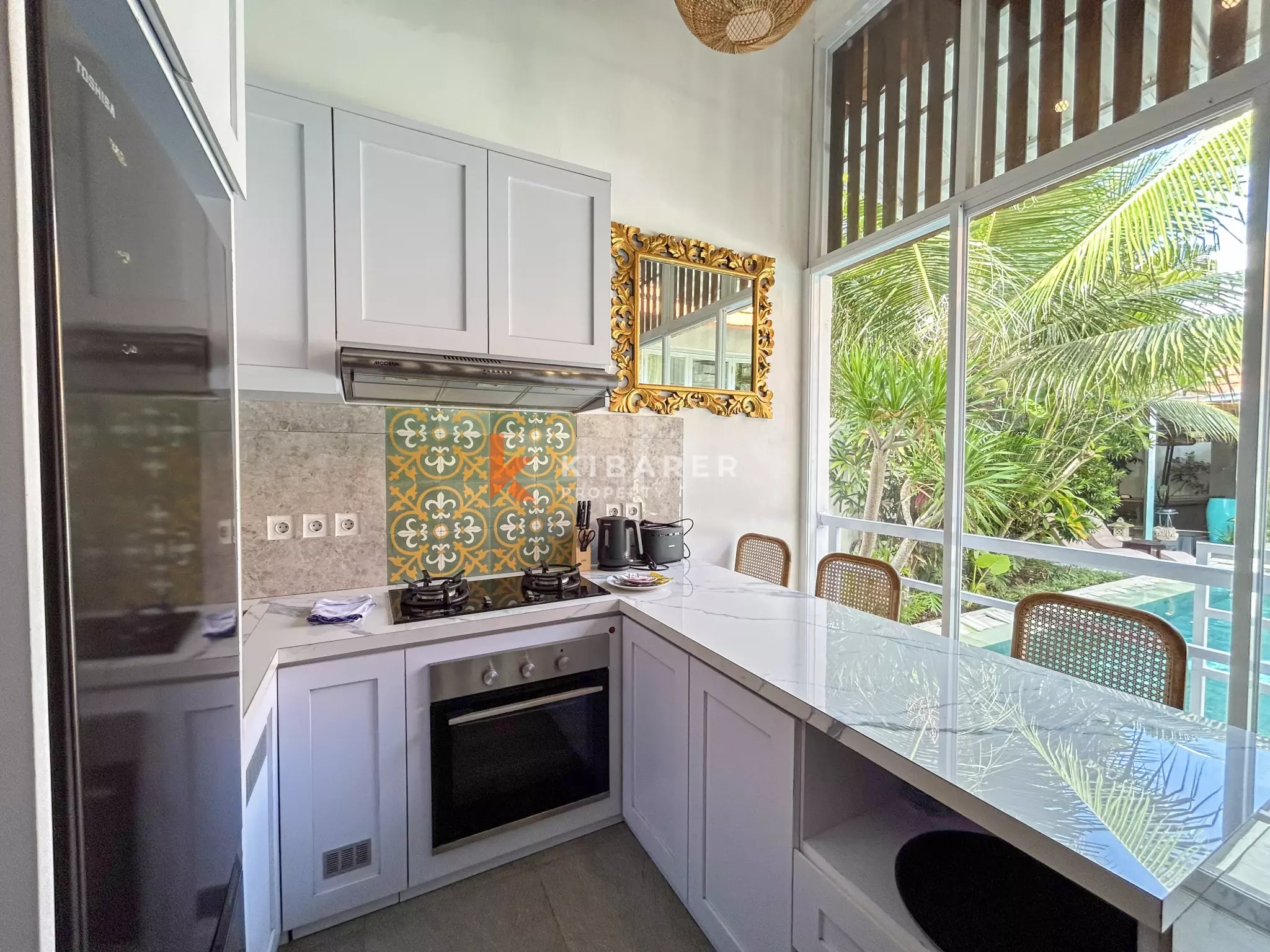 Elegant Four-Bedroom Tropical Pool Villa with Enclosed Living Spaces in Umalas