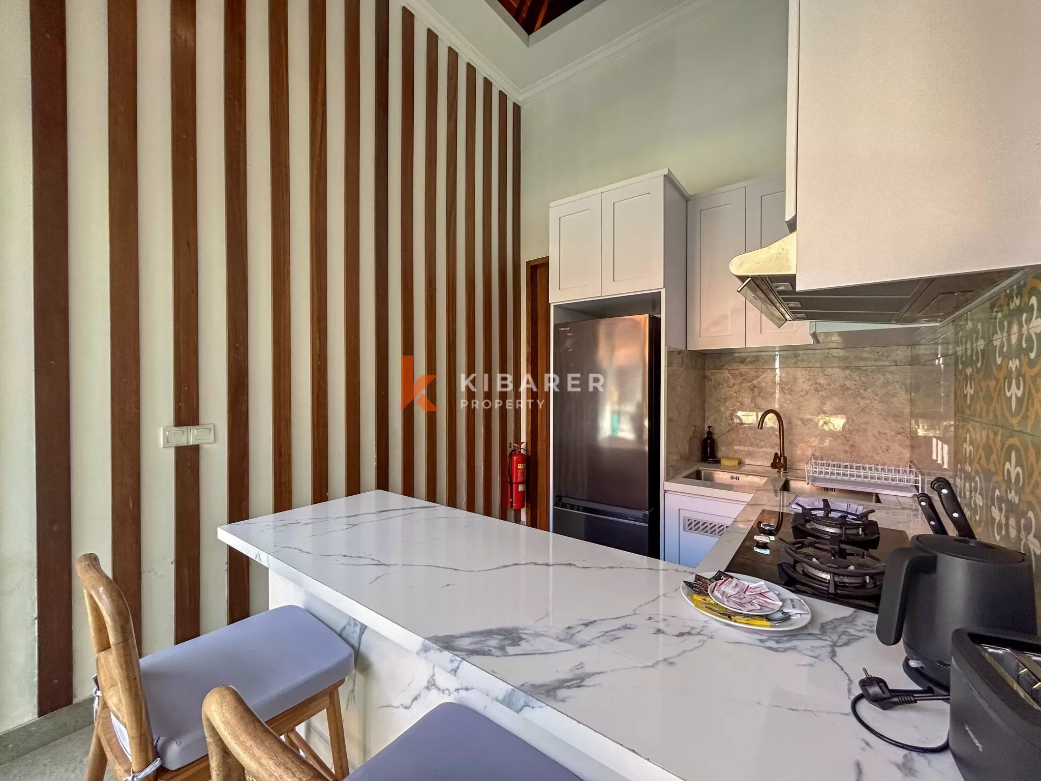 Elegant Four-Bedroom Tropical Pool Villa with Enclosed Living Spaces in Umalas