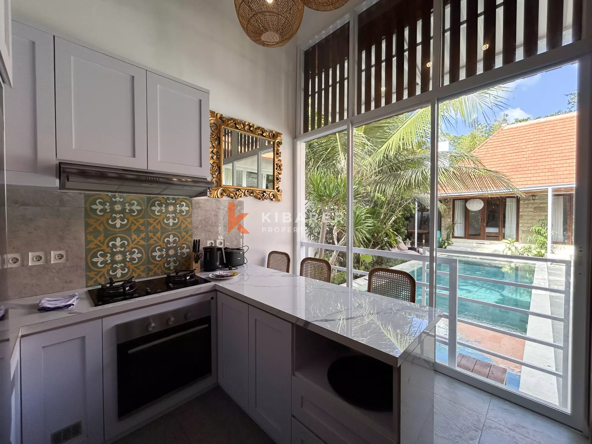 Elegant Four-Bedroom Tropical Pool Villa with Enclosed Living Spaces in Umalas