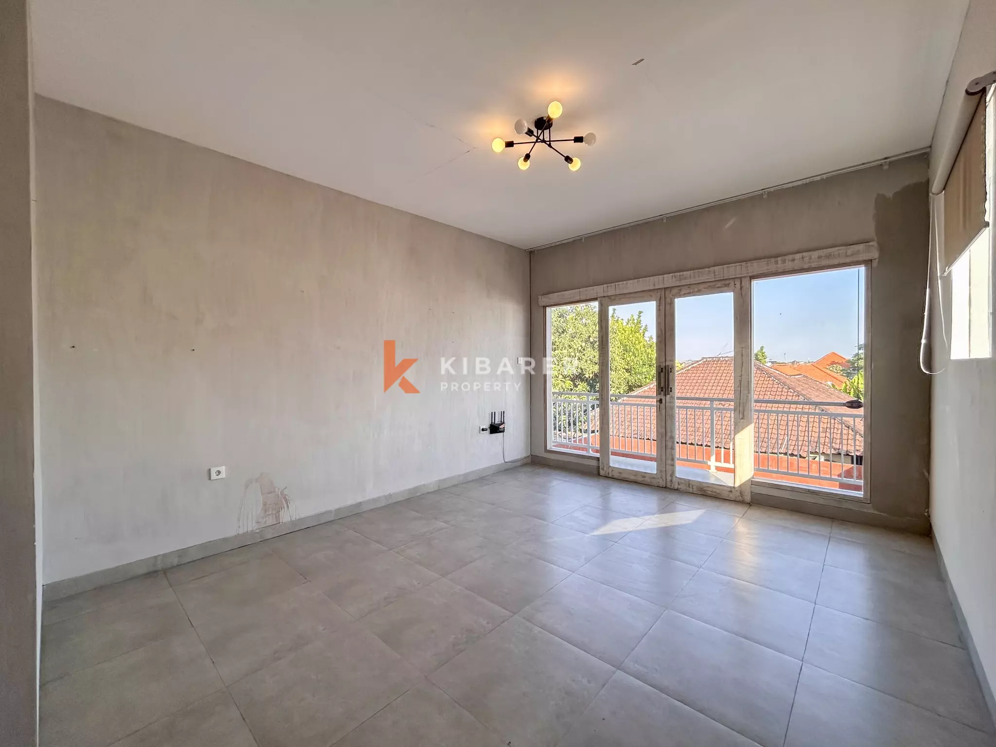 Comfortable Three-Bedroom Unfurnished Family Villa with Open Living Space in Umalas