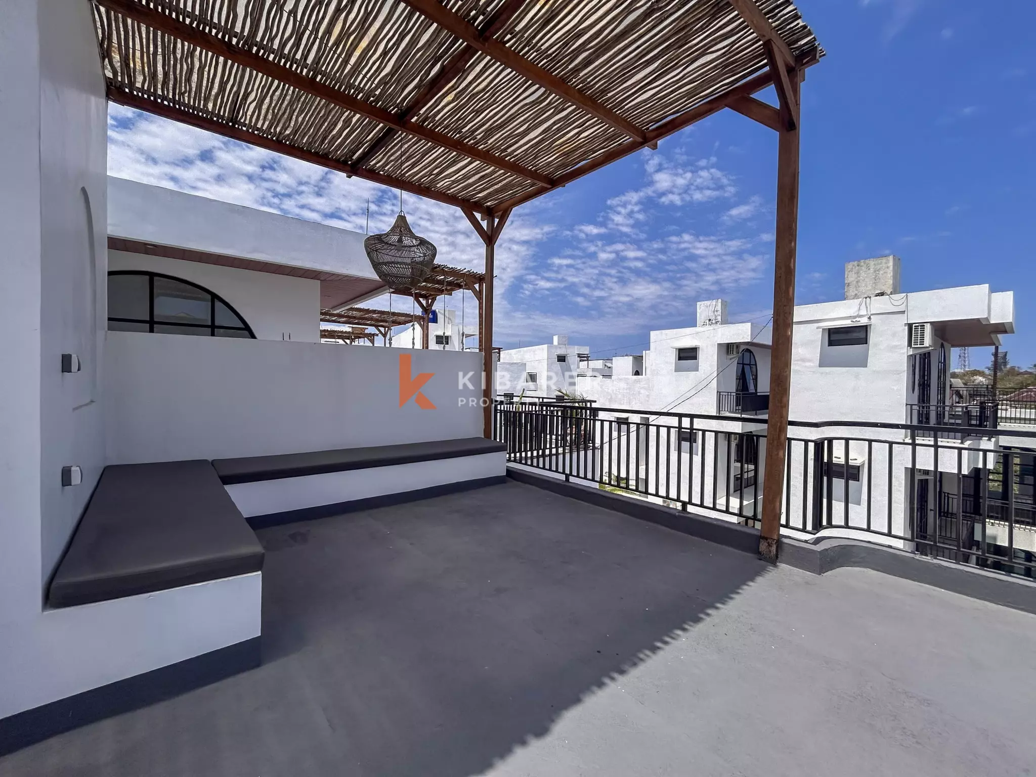 Chic Three-Bedroom Villa with Rooftop Lounge in Balangan