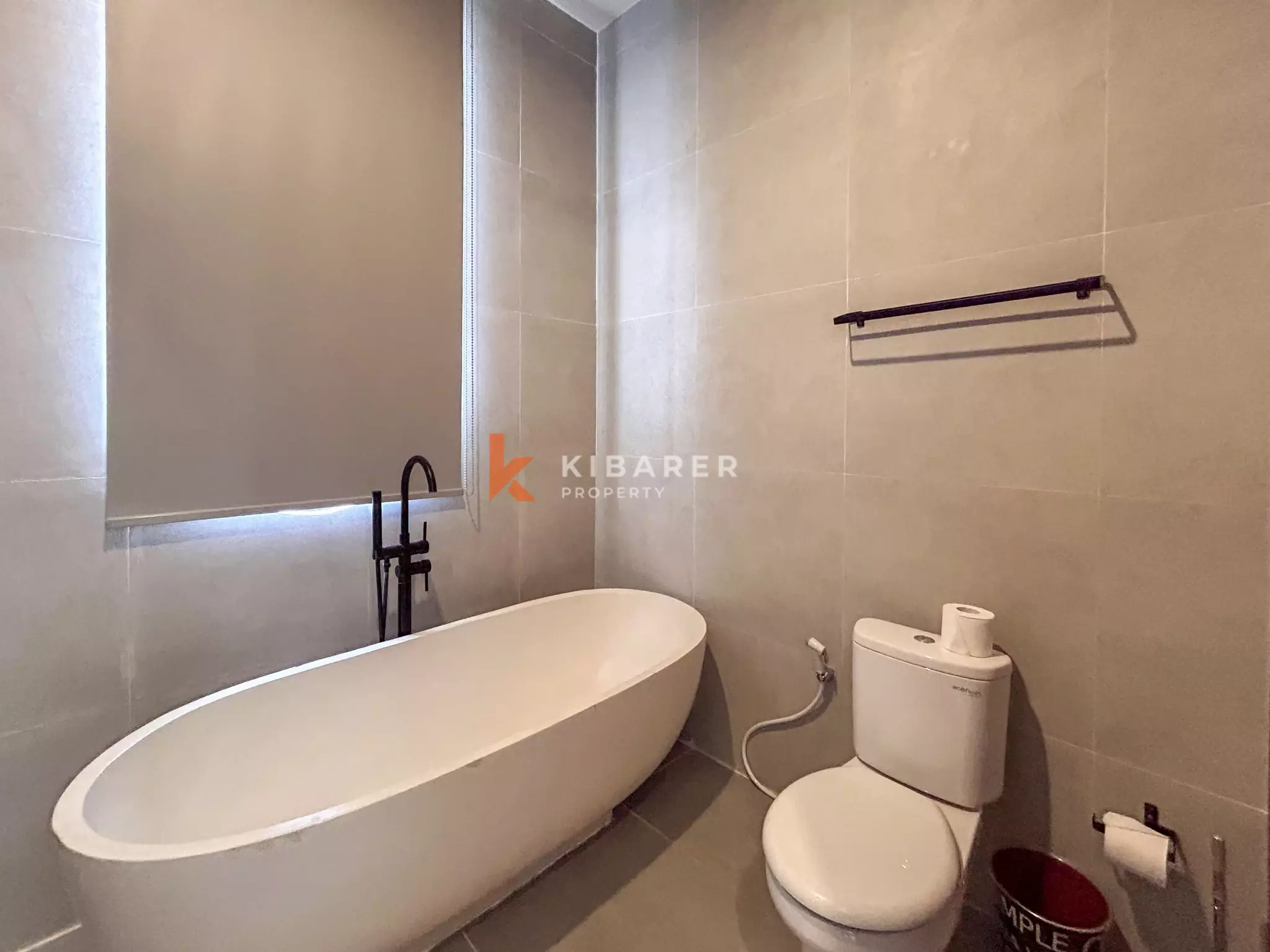 Chic Three-Bedroom Villa with Rooftop Lounge in Balangan