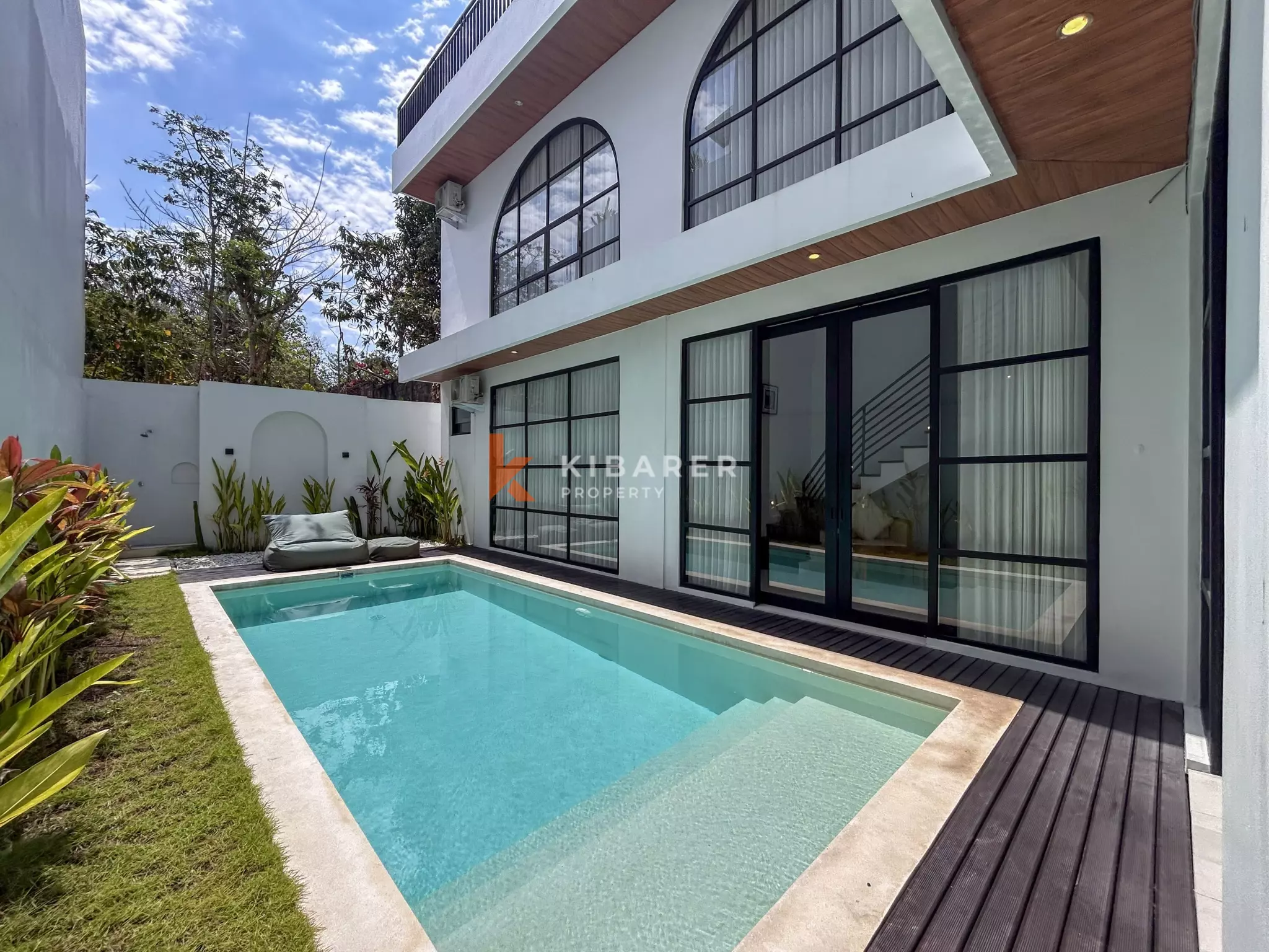 Chic Three-Bedroom Villa with Rooftop Lounge in Balangan
