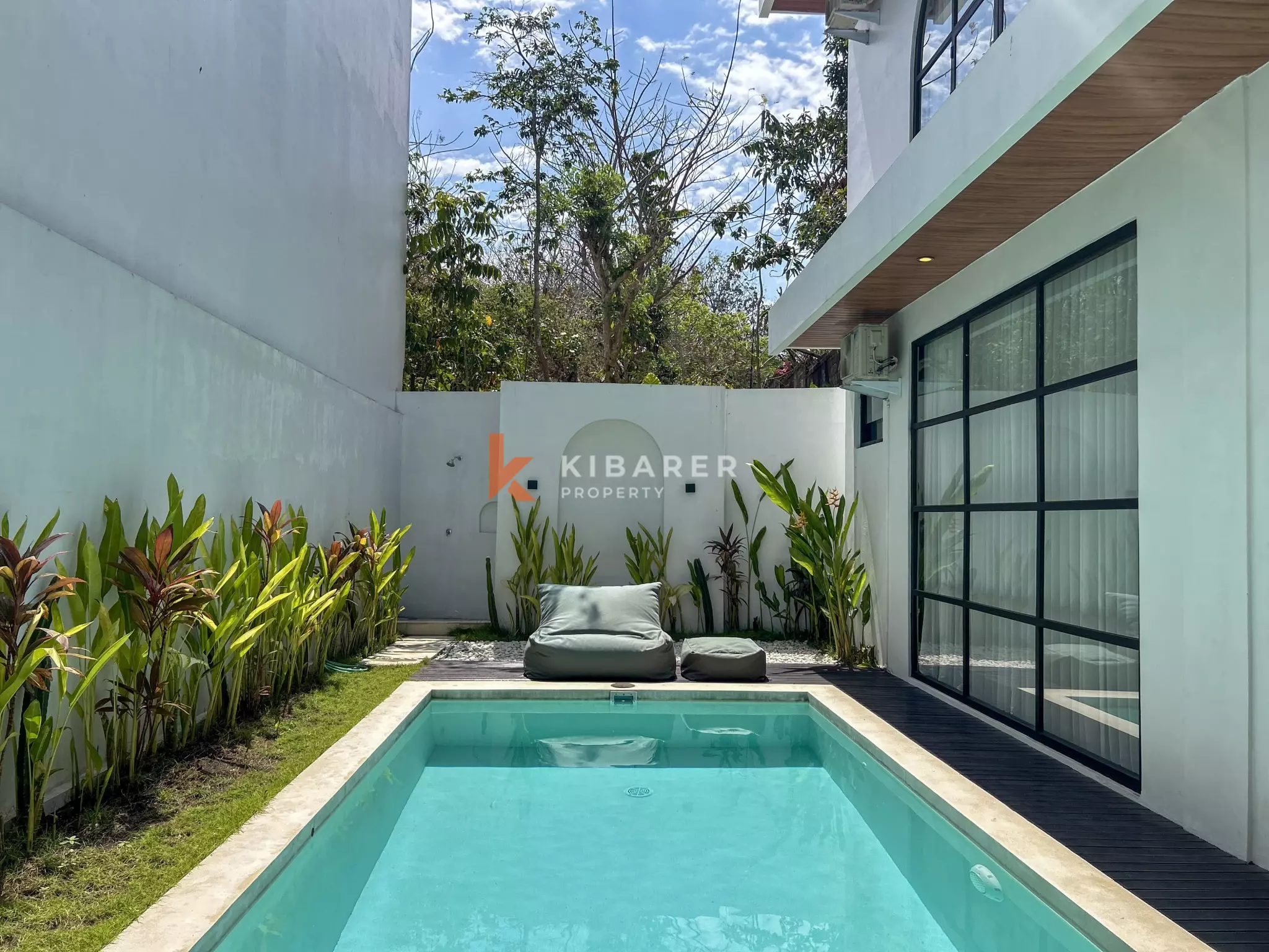Chic Three-Bedroom Villa with Rooftop Lounge in Balangan