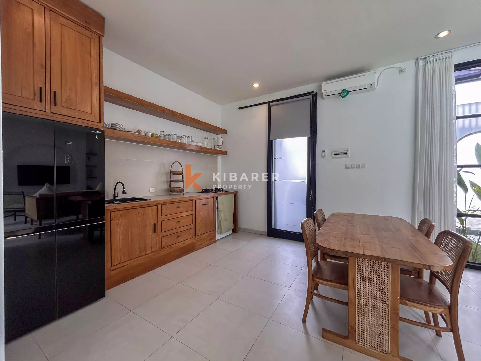 Chic Three-Bedroom Villa with Rooftop Lounge in Balangan