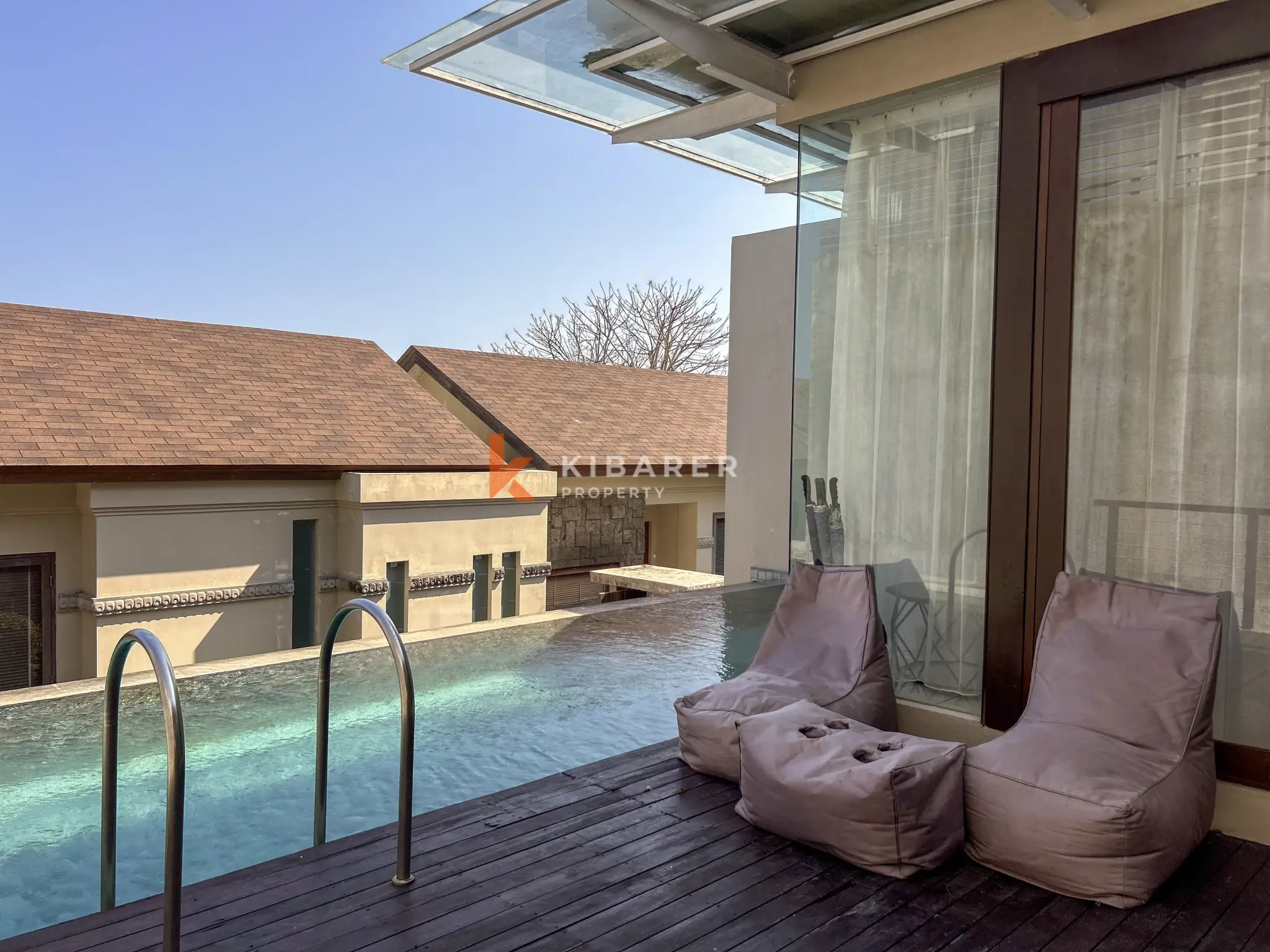 Modern Three-Bedroom Villa with Pool and Scenic Balcony Views in Nusa Dua