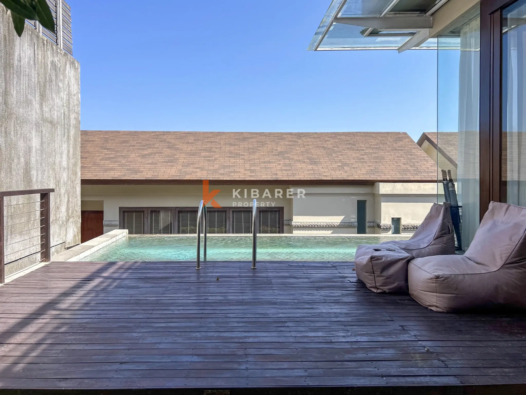 Modern Three-Bedroom Villa with Pool and Scenic Balcony Views in Nusa Dua