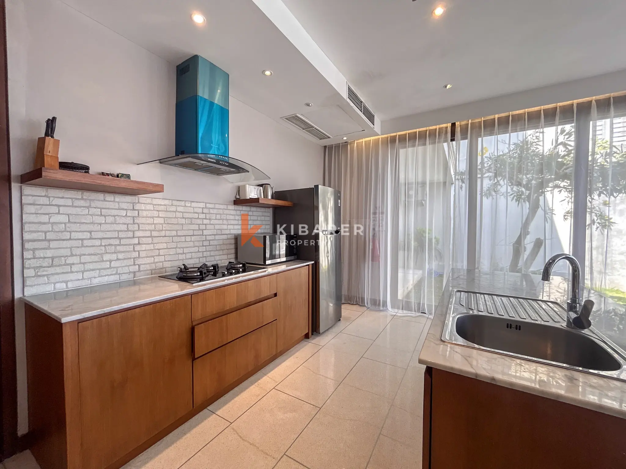 Modern Three-Bedroom Villa with Pool and Scenic Balcony Views in Nusa Dua